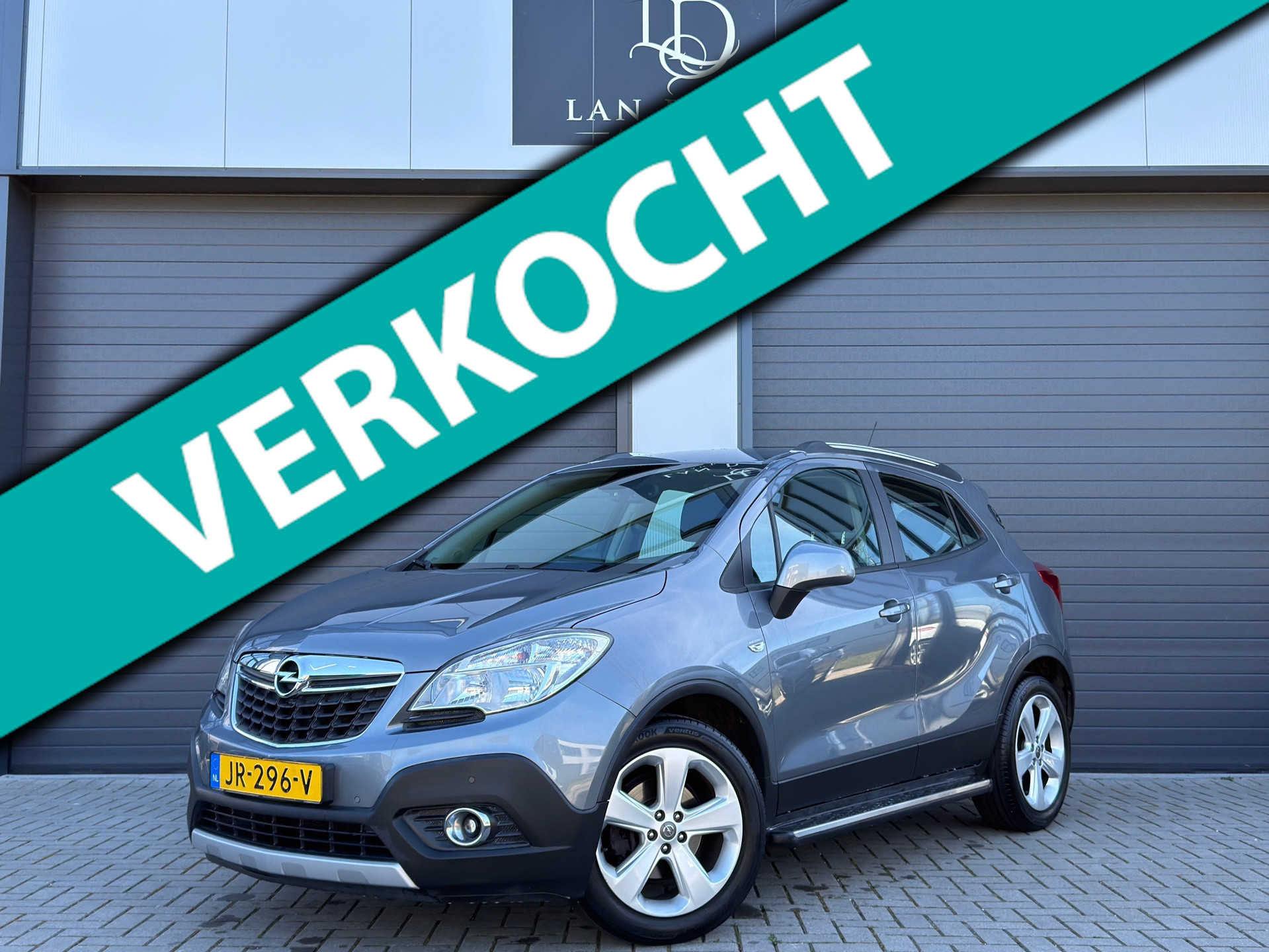 Opel Mokka 1.6 Cosmo / NAVI / NIEUWE DB / TREKHAAK / PDC 2013 - voorkant