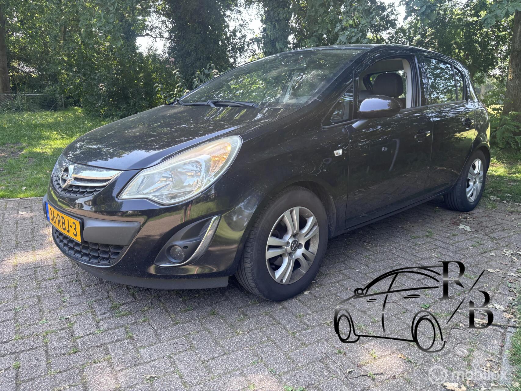 Opel Corsa 1.3 CDTi EcoFlex S/S Cosmo Navi Leer Airco 2011 - voorkant