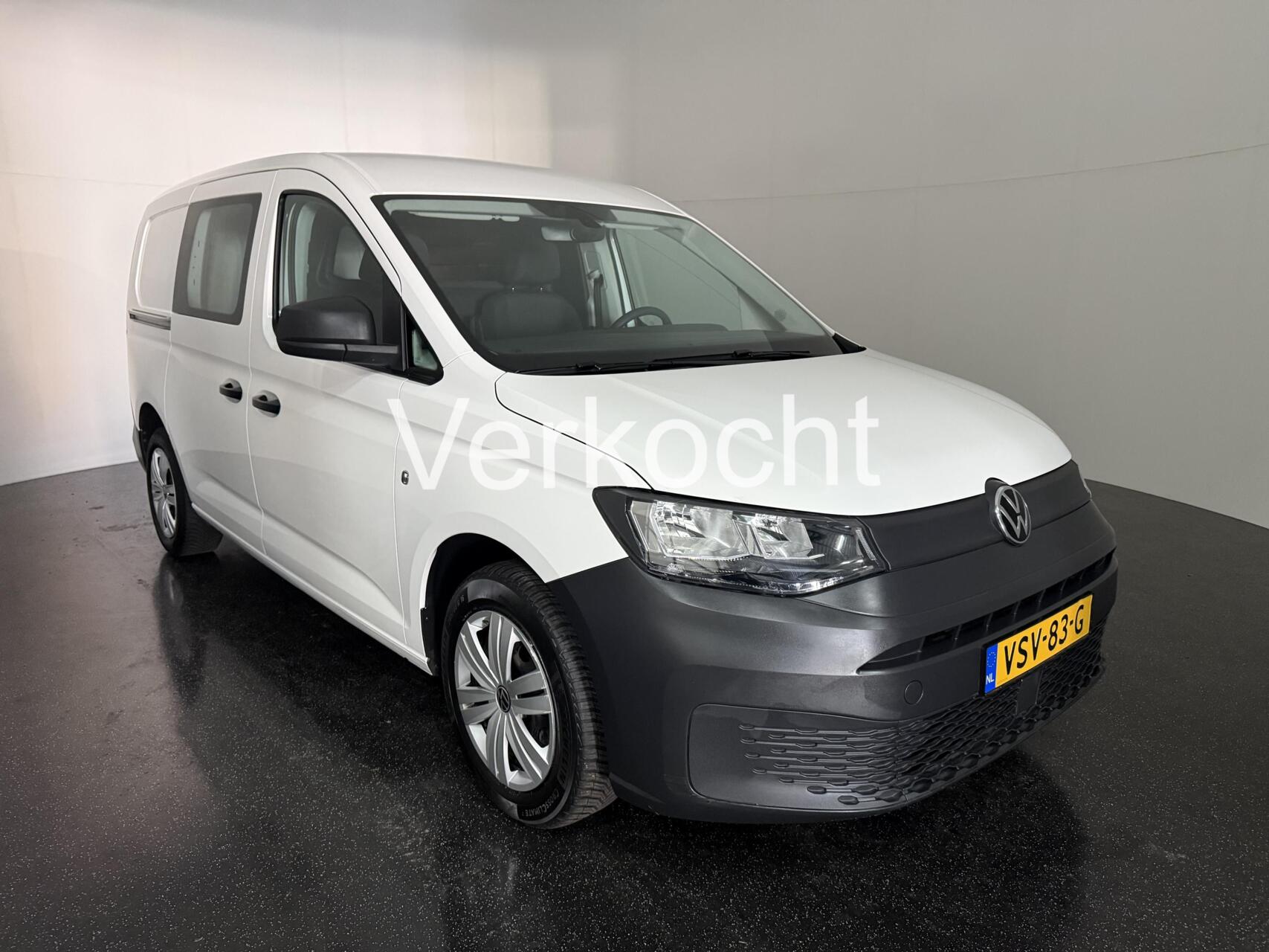 Foto van Volkswagen Caddy Modified Partition Wall