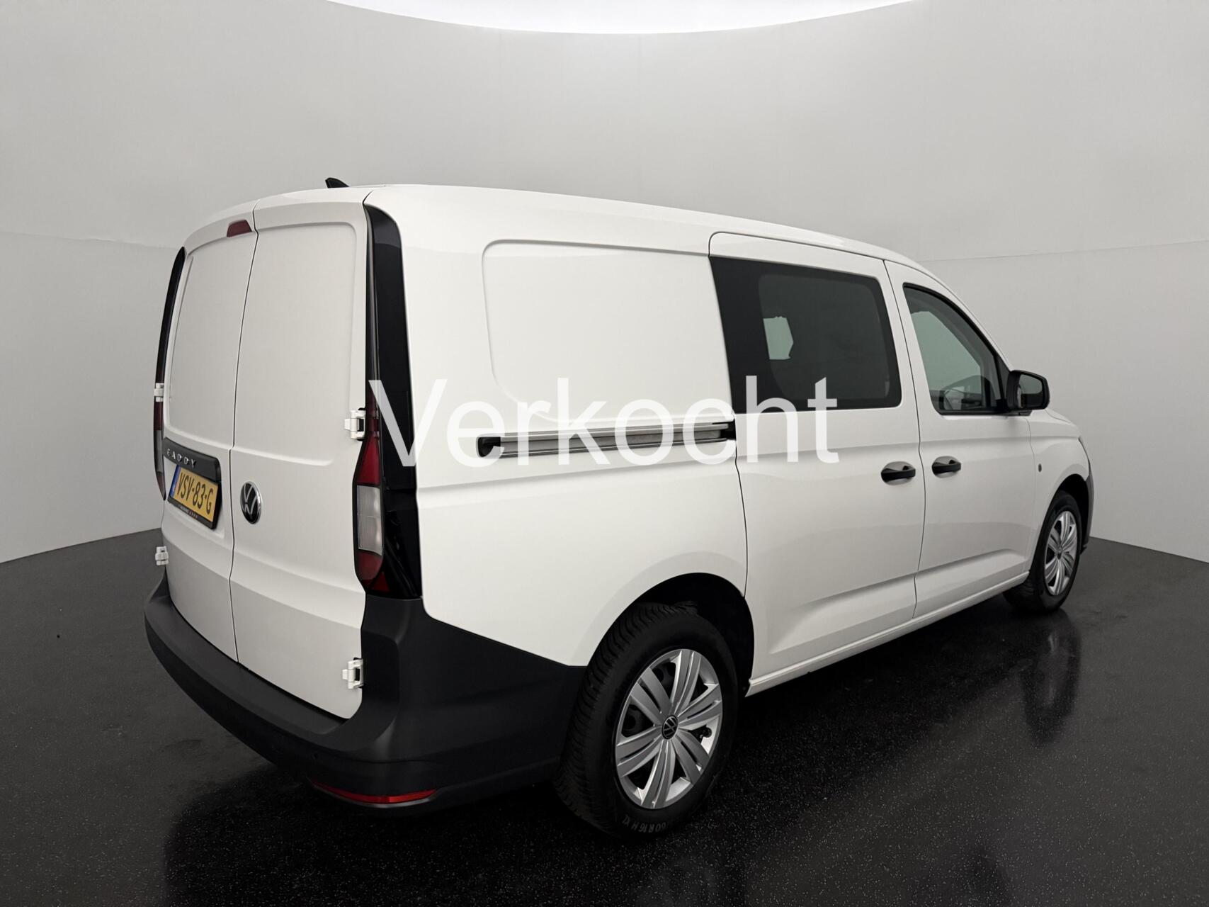 Foto van Volkswagen Caddy Modified Partition Wall