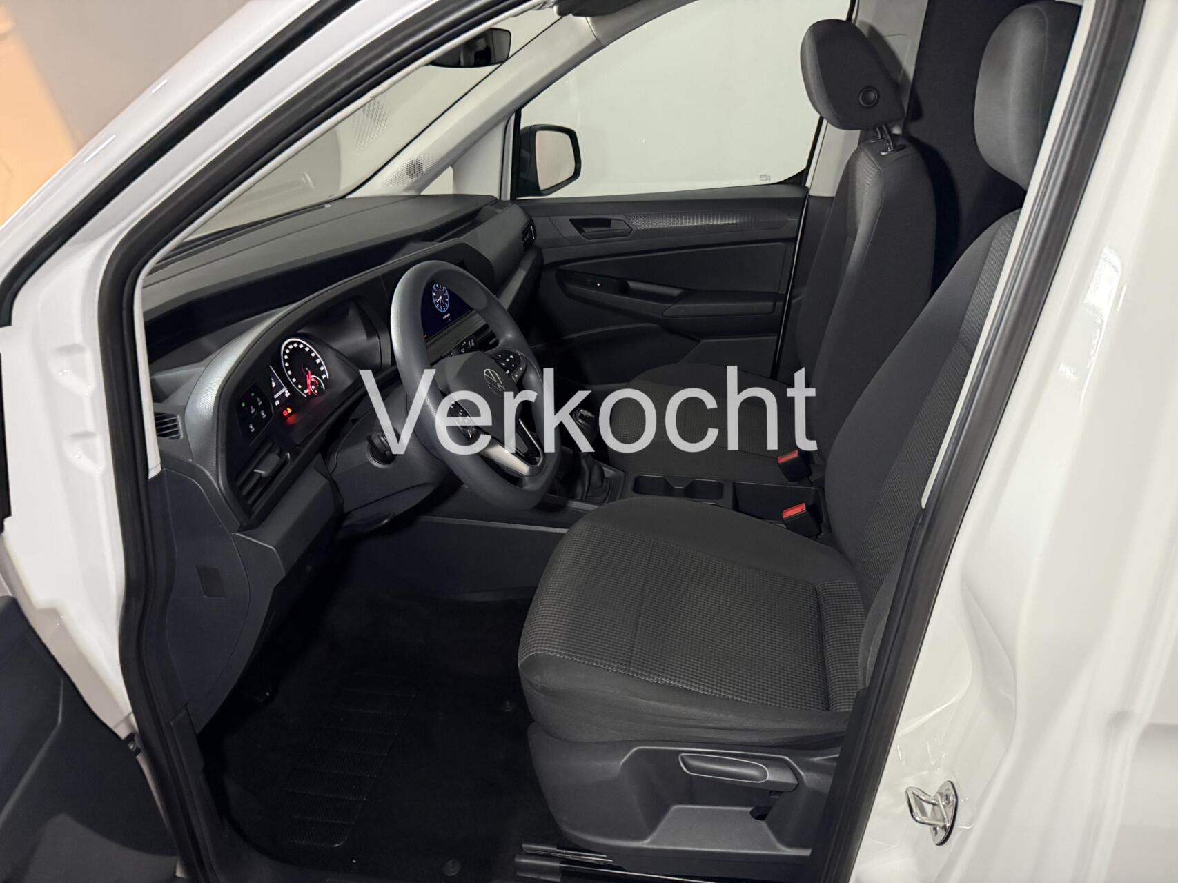Foto van Volkswagen Caddy Modified Partition Wall