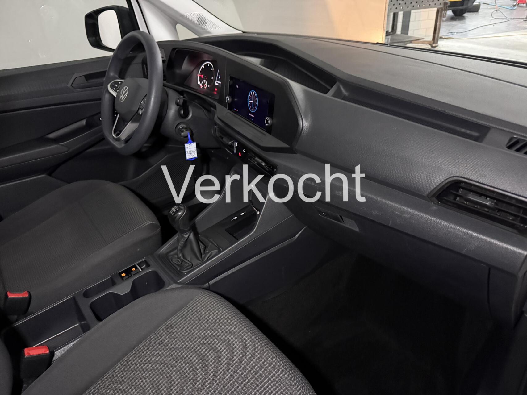 Foto van Volkswagen Caddy Modified Partition Wall