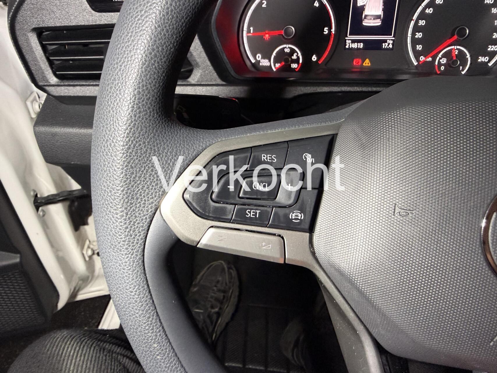 Foto van Volkswagen Caddy Modified Partition Wall