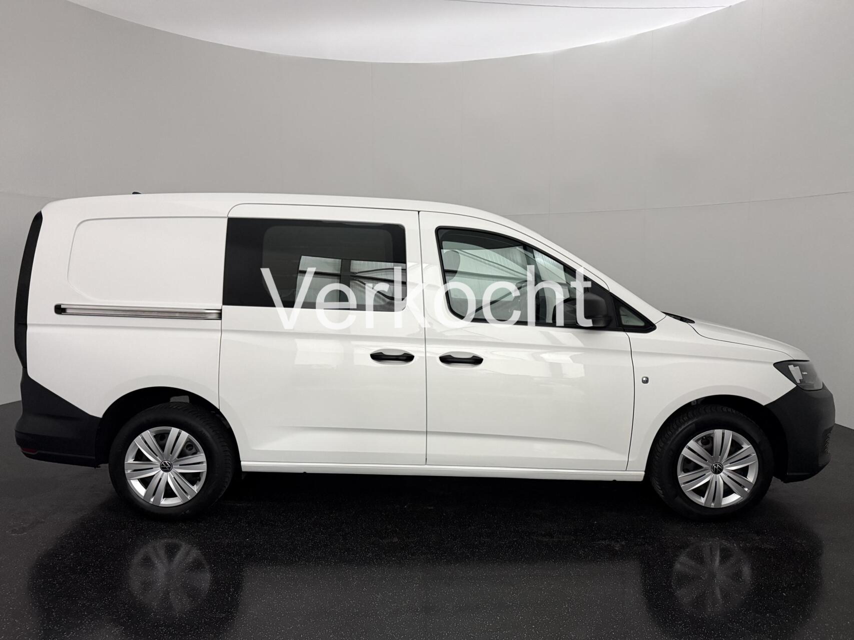 Foto van Volkswagen Caddy Modified Partition Wall