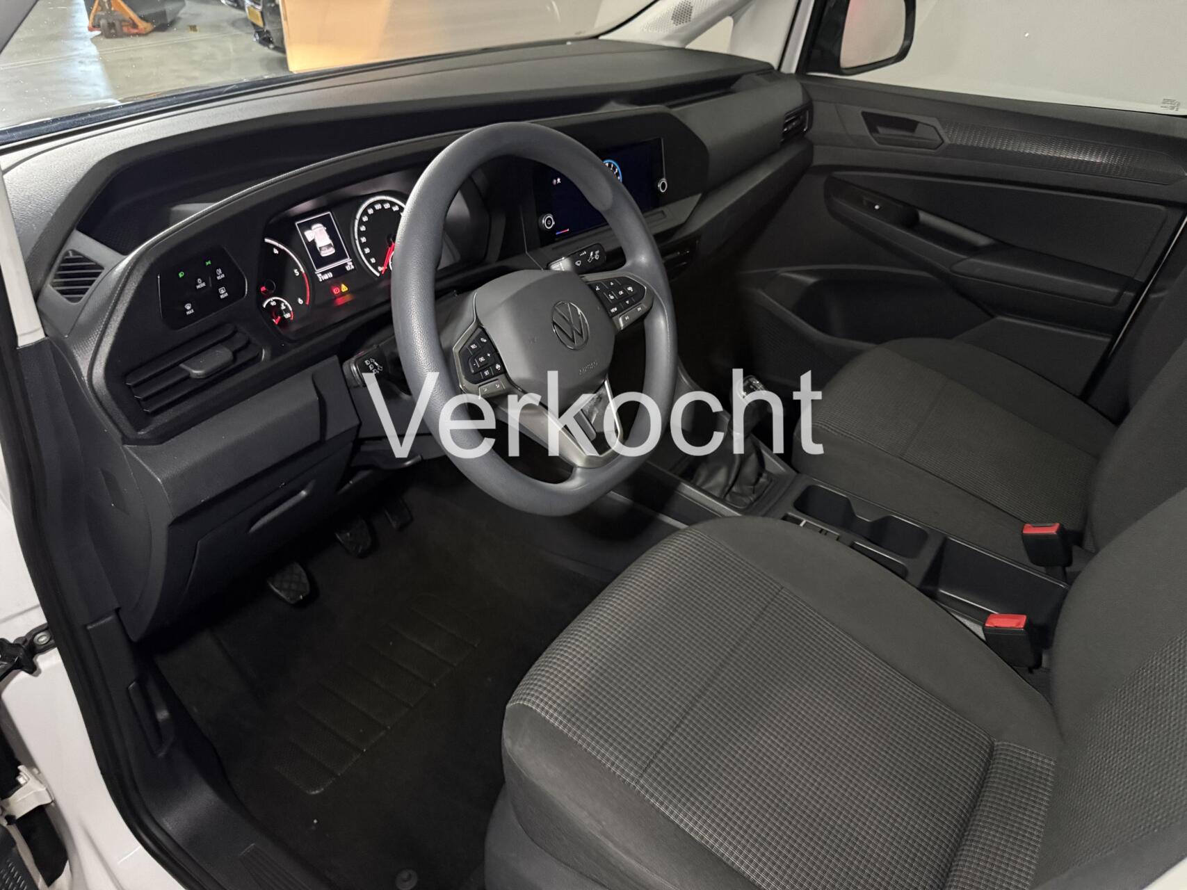 Foto van Volkswagen Caddy Modified Partition Wall