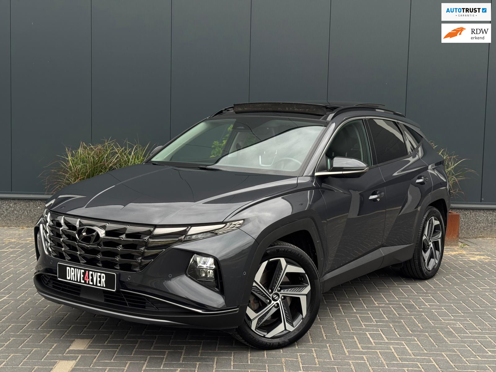 Hyundai Tucson 1.6 T-GDI PHEV Premium 4WD FULL PANO | LEDER | SPORTVELGEN | ECC 2022 - voorkant