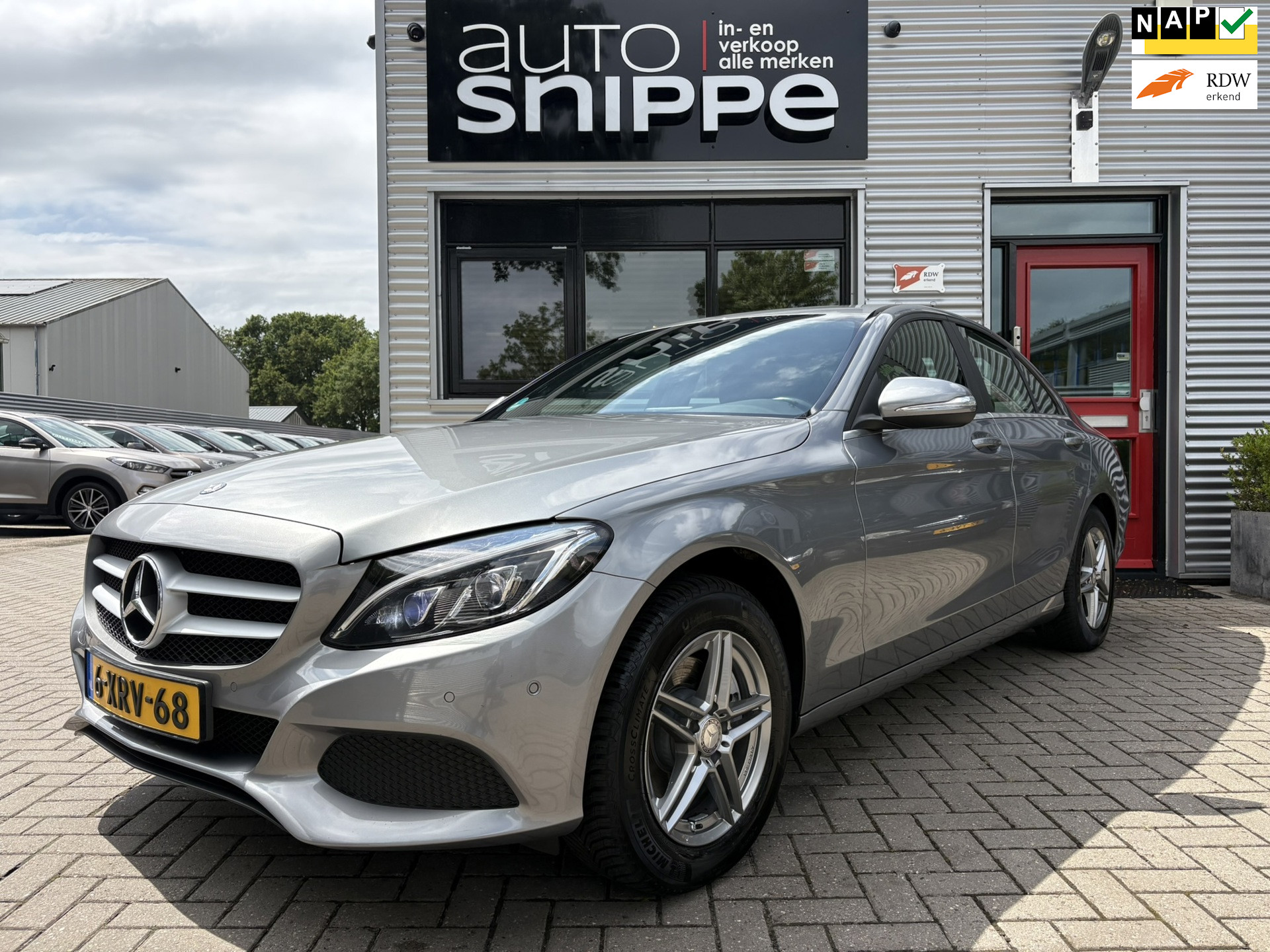 Mercedes-Benz C 200 200 Ambition -AUTOMAAT-SPORTSTOEL-VOLLEDER-STOELVERWARMING-LED-TREKHAAK-1800 KG TREKGEWICHT-ORIGINEEL NL! 2014 - voorkant