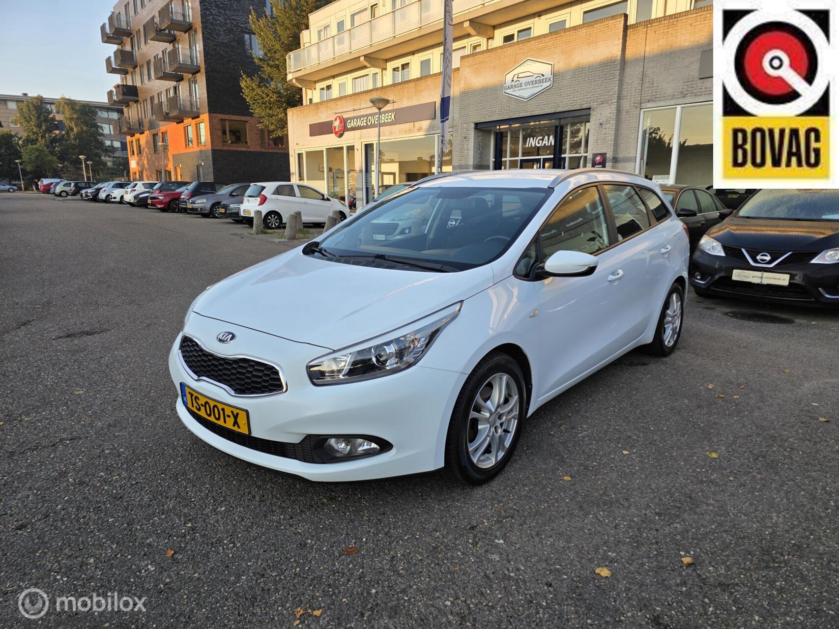 Kia Cee'd Sportswagon 1.4 CVVT 2014 CRUISE/AIRCO/BLUETOOTH!! 2014 - voorkant