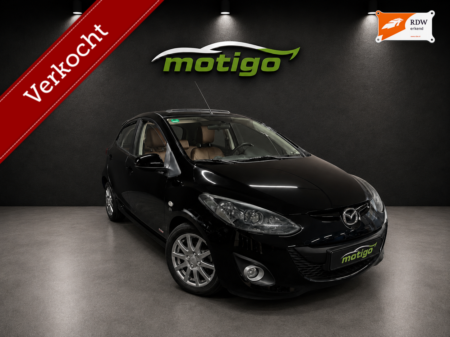 Mazda Mazda 2 , 1.3 |GT-M Line| |Airco| |Stoelverwarming|leder+pano 2011 - voorkant