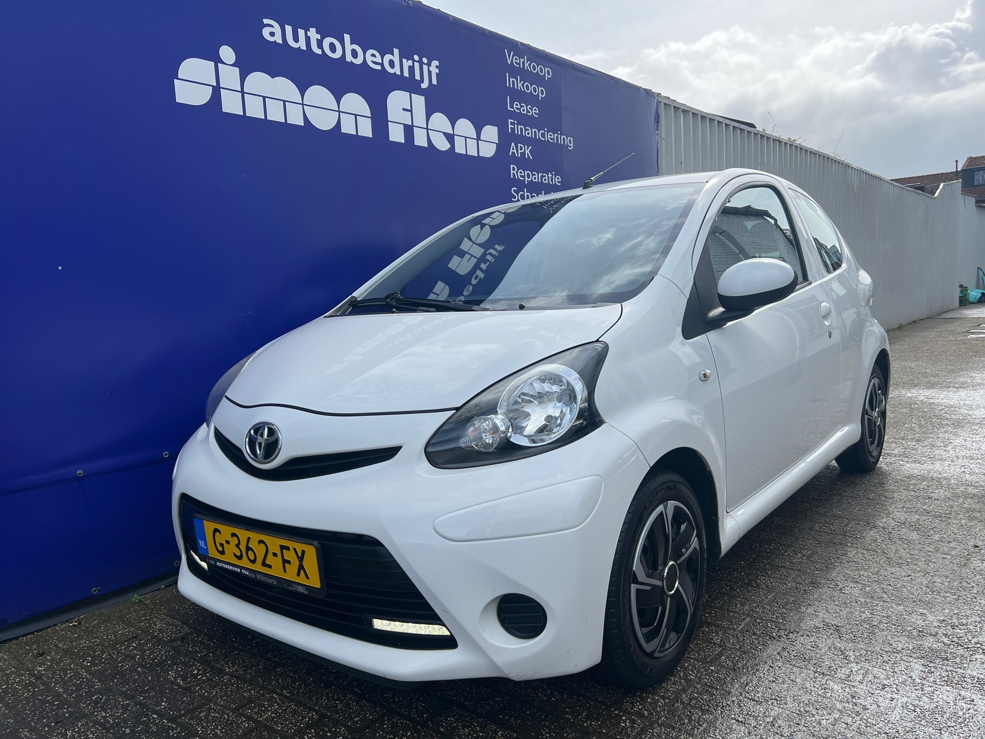 Toyota Toyota Aygo 1.0 VVT-i Dynamic Orange*AIRCO*NAVI* 2014 - voorkant
