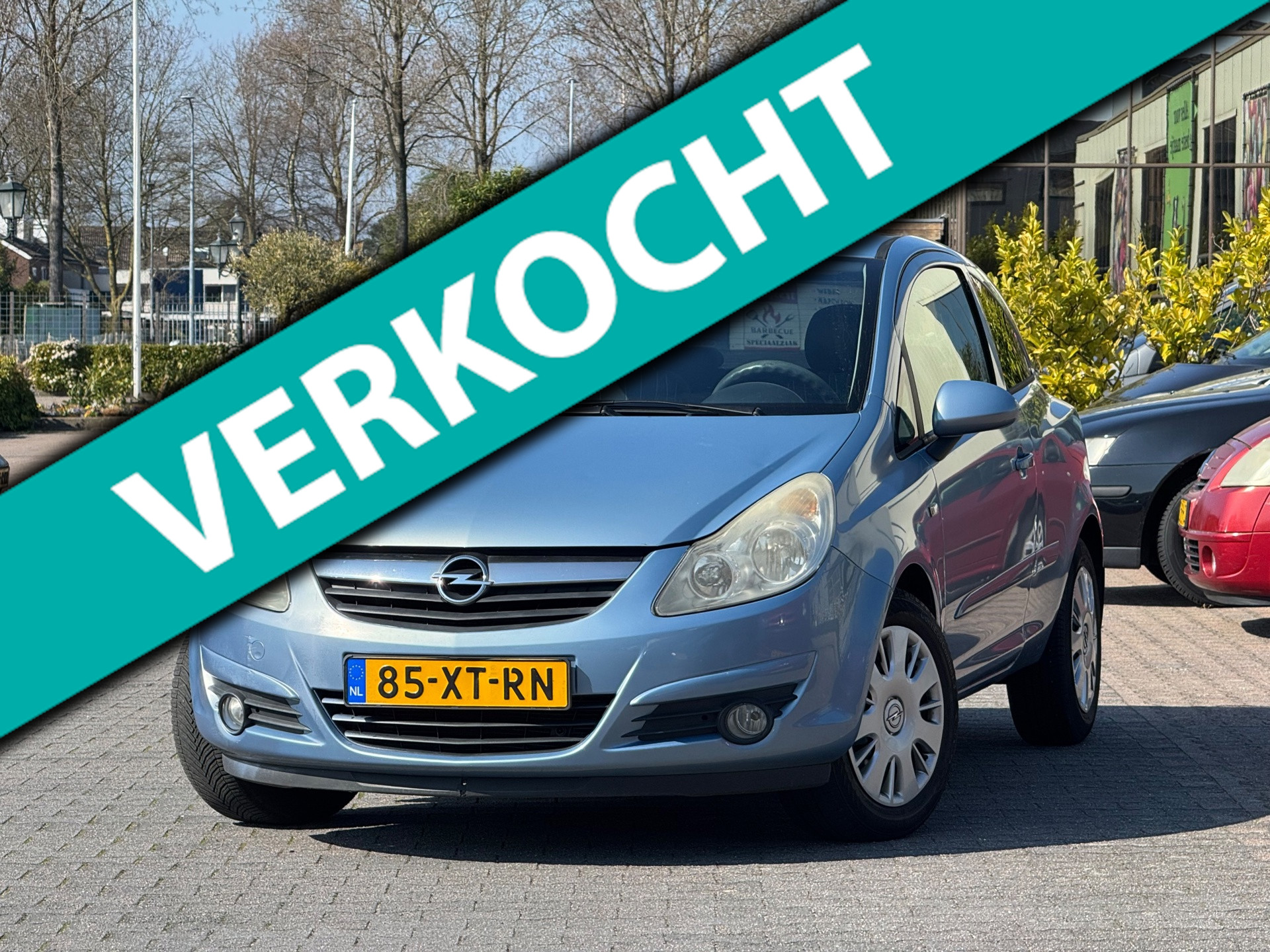 Opel Corsa 1.4 | APK 19-02-2027 | Airco | Cruise control | 2 sleutels | Elektrische ramen en spiegels | 2007 - voorkant