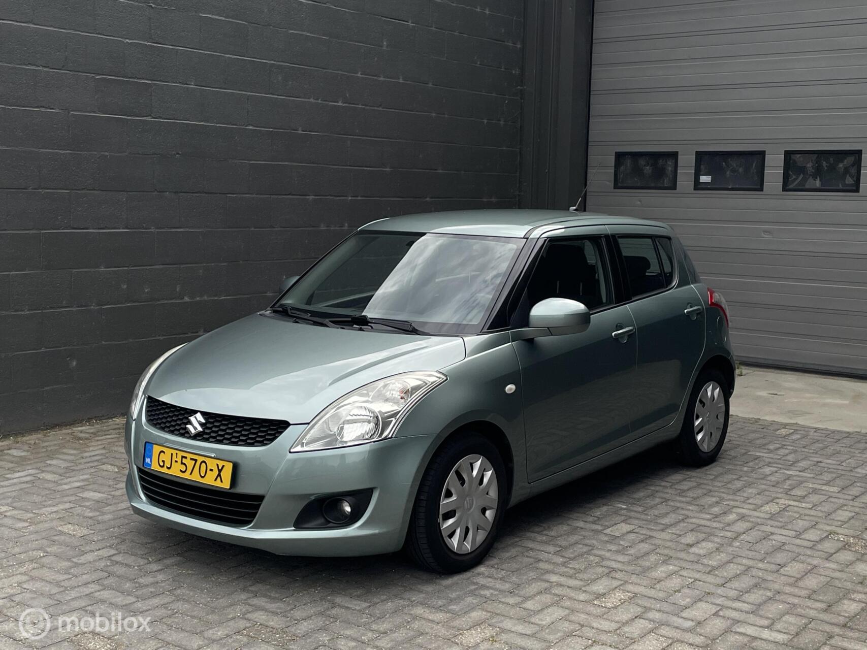 Suzuki Swift 1.2 Facelift | AIRCO | Trekhaak | Nieuwe APK | Youngtimer 2011 - voorkant