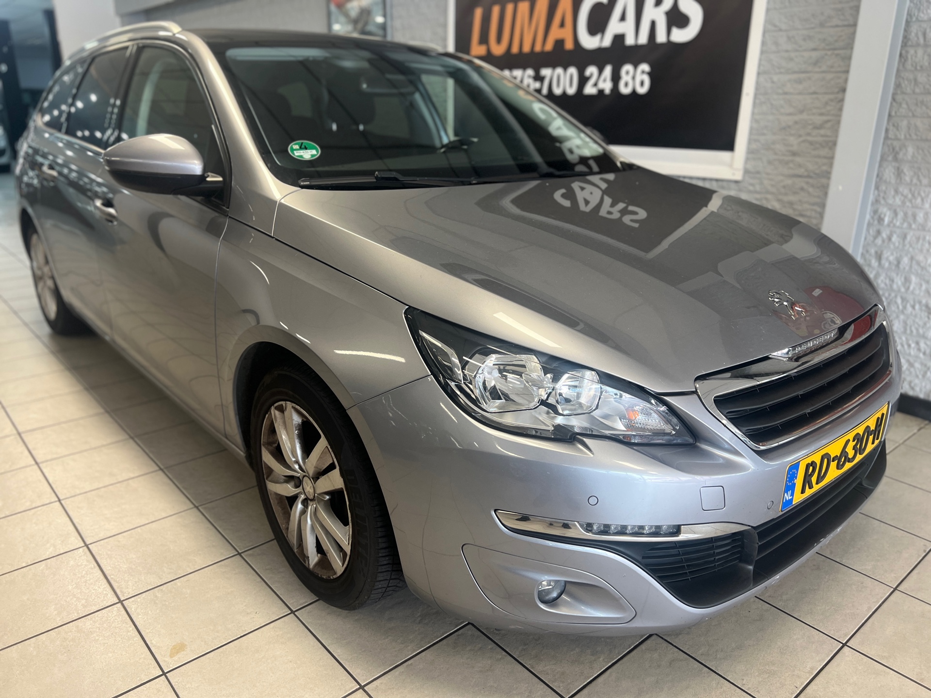 Peugeot 308 1.2 PureTech Blue Lion | Distri. Verv. | Pano 2017 - voorkant