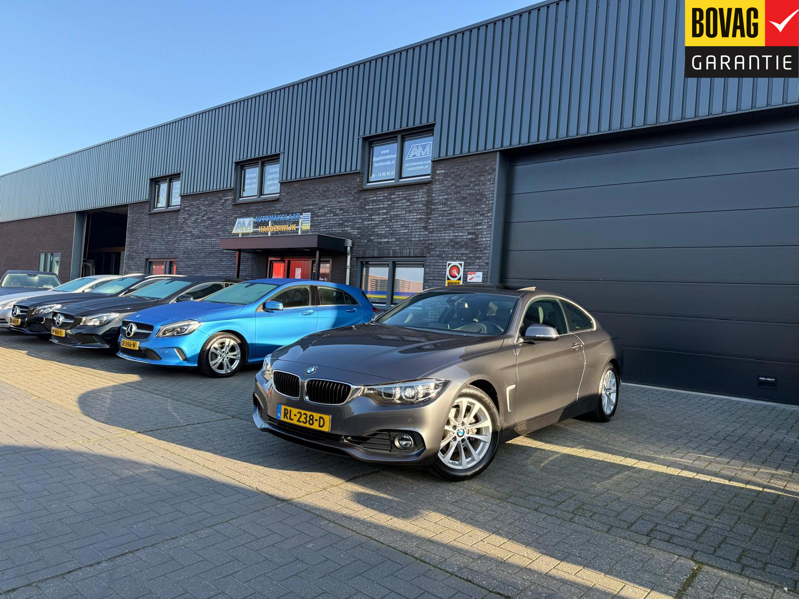 BMW 4-serie Coupé 420i High Executive 2018 - voorkant