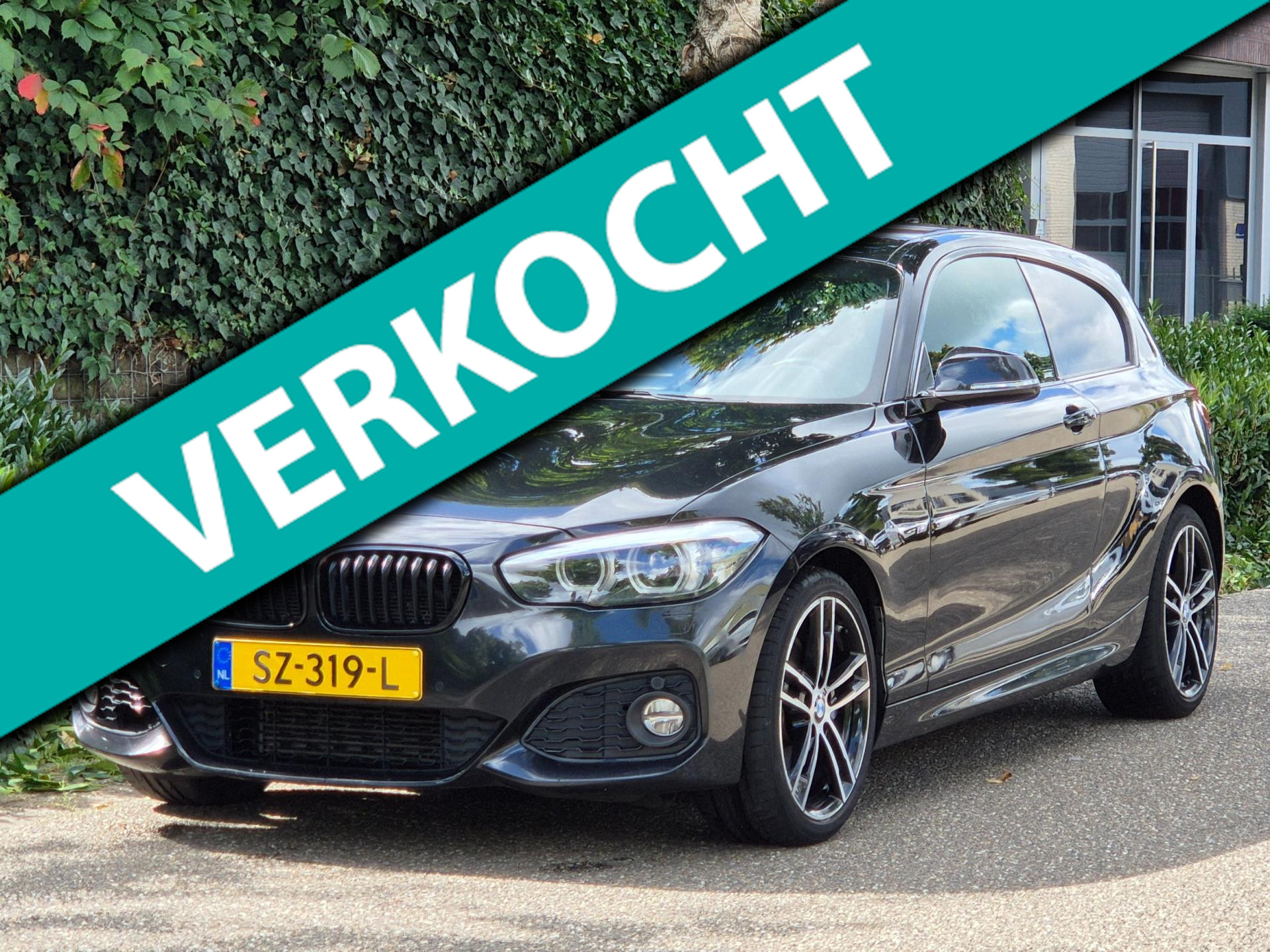 BMW 118i M Sport CarPlay Adaptieve LED Keyless Harman Kardon NAP Rijklaar Executive Coupé 2018 - voorkant