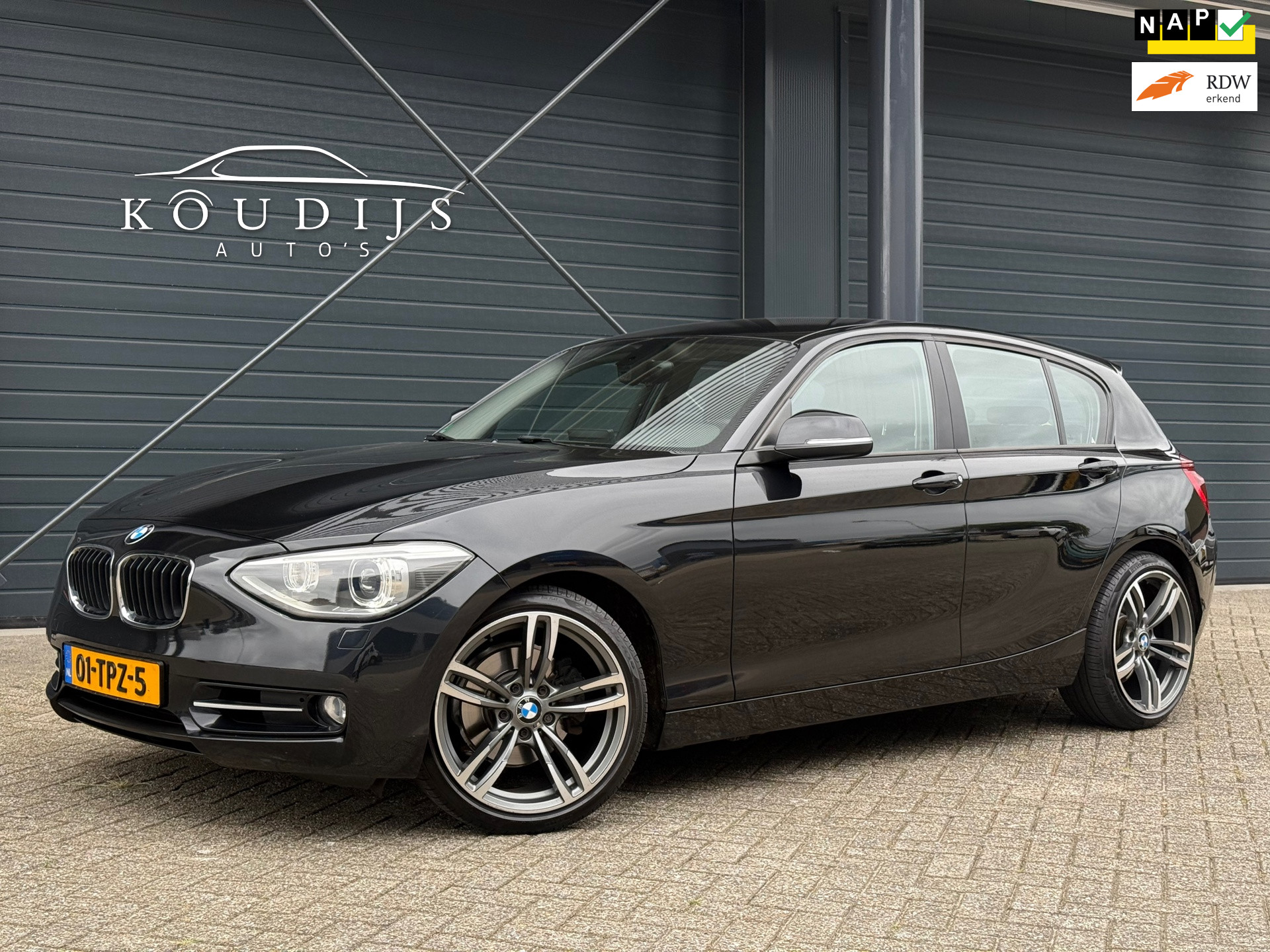 BMW 1er Reihe 118i Business+, Stoelverwarming, Afn. Trekhaak, Dealer onderhouden 2012 - voorkant