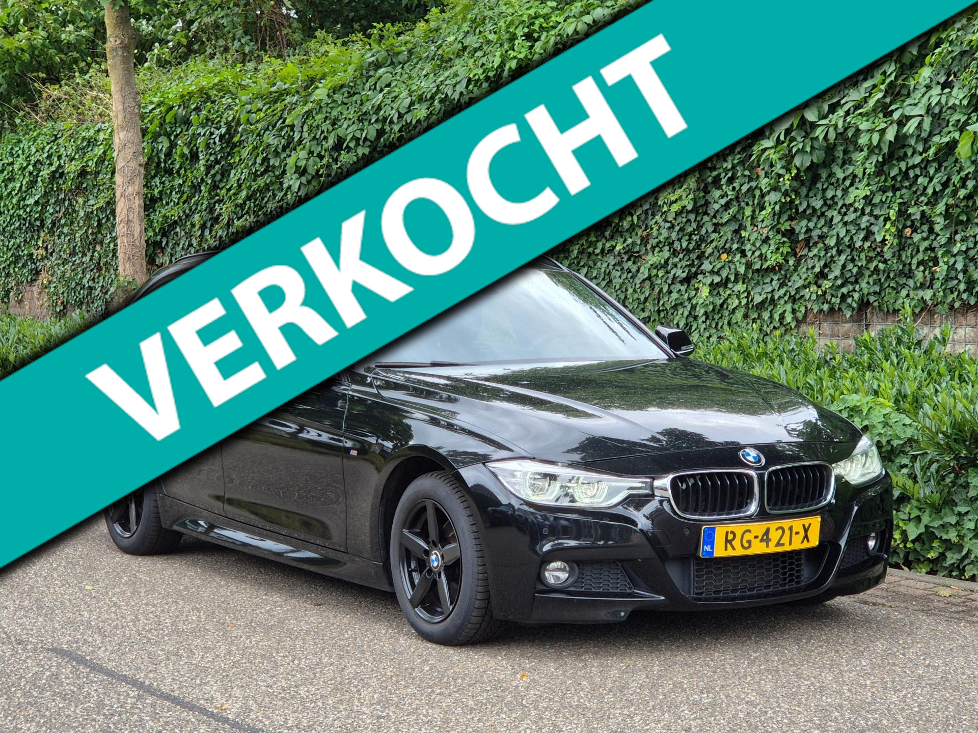 BMW 3-serie Touring 320i High Executive M Sport Panorama Apple CarPlay Trekhaak NAP APK Rijklaar 2017 - voorkant