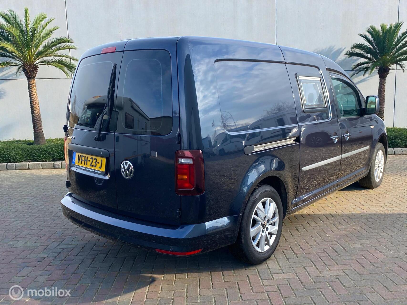 Foto van Volkswagen Caddy Modified Partition Wall