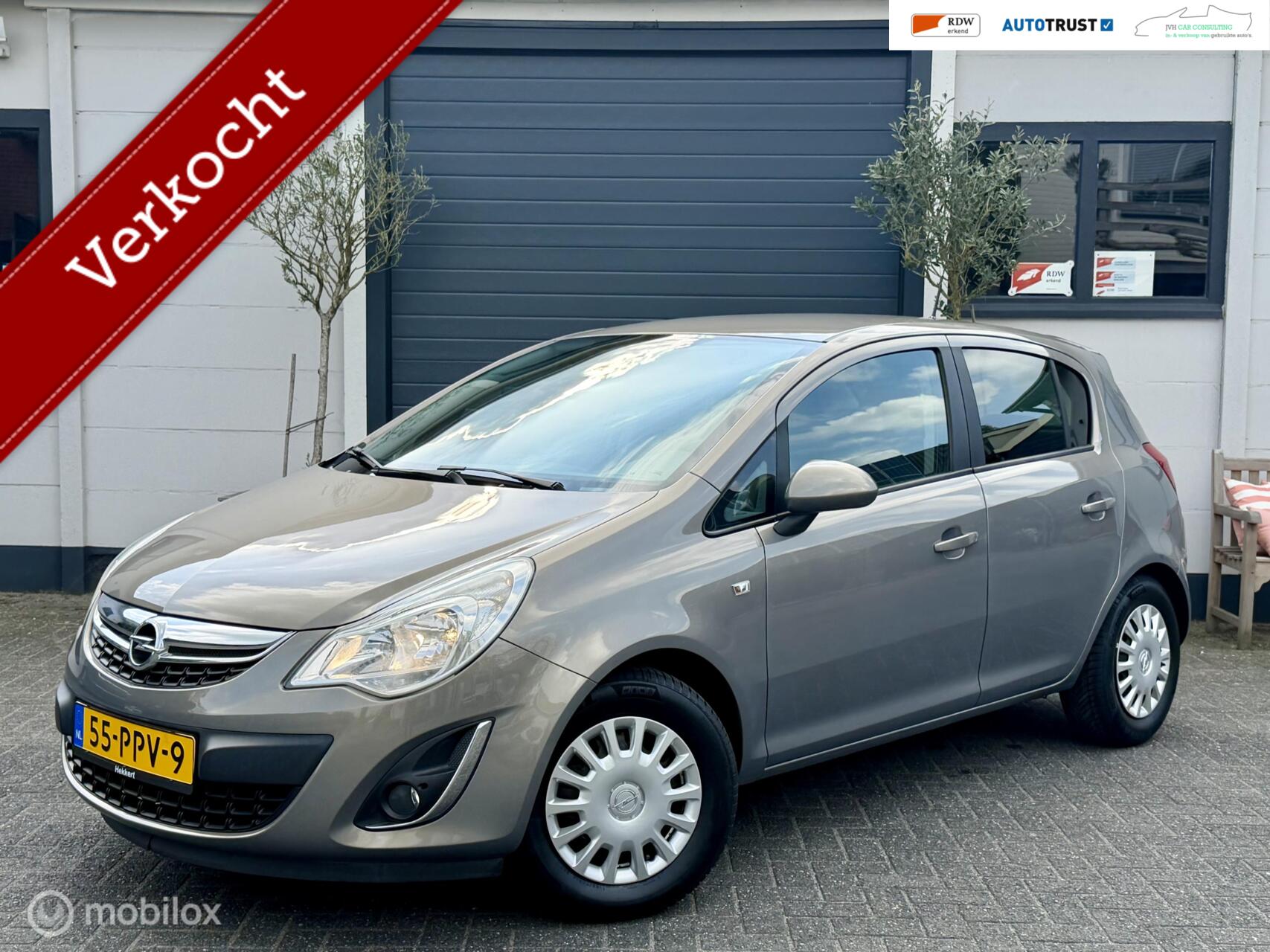 Opel Corsa 1.4-16V 100pk Edition|RIJKLAAR|NAV|AC|OPEL DLR OH 2011 - voorkant