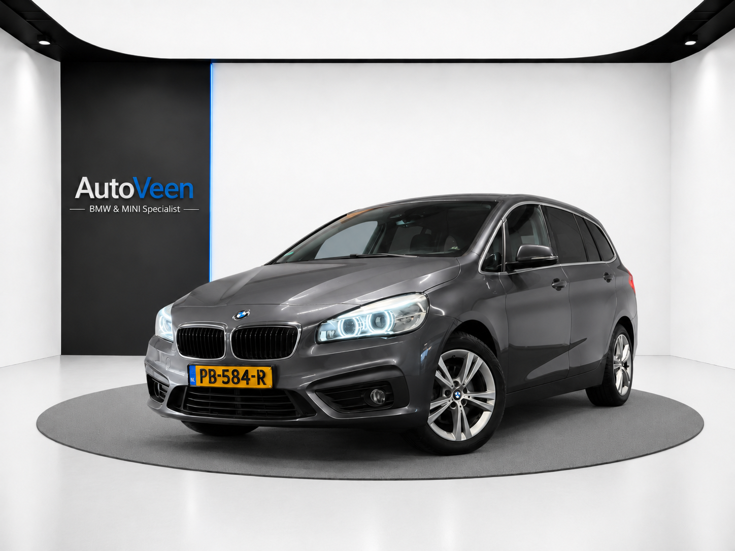 BMW 218i Gran Tourer 218i Corporate Lease Executive (LED, NL AUTO, TREKHAAK, CRUISE, PARKEERSENSOREN) 2017 - voorkant
