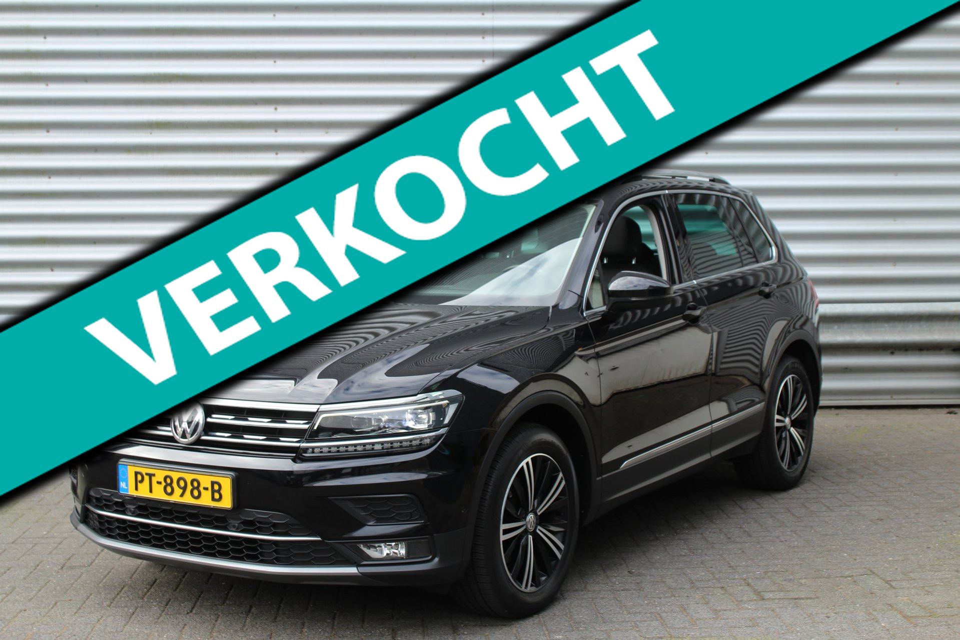 Volkswagen Tiguan 1.4 TSI 150pk Highline DSG6 Panoramadak  NL-Auto NAP 2017 - voorkant