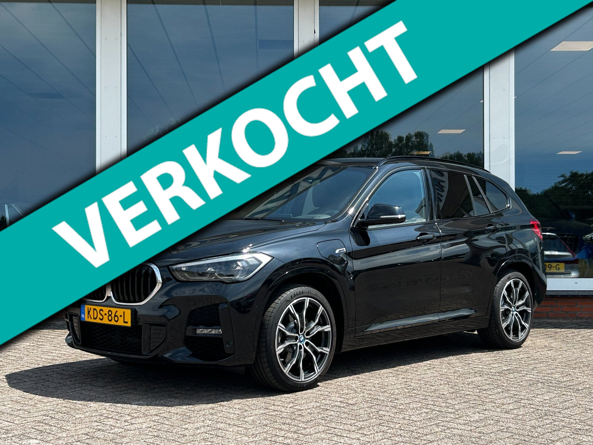 BMW X1 Xdrive25e XDrive25e AUT. High Executive M-Sport - Leder - 19 inch - Trekhaak - Nieuwstaat 2022 - voorkant