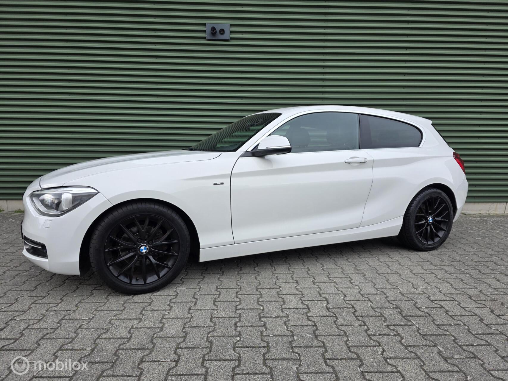BMW 1er Reihe 114i EDE Executive|Sport|Leer|M-Stuur|Netjes! 2013 - voorkant
