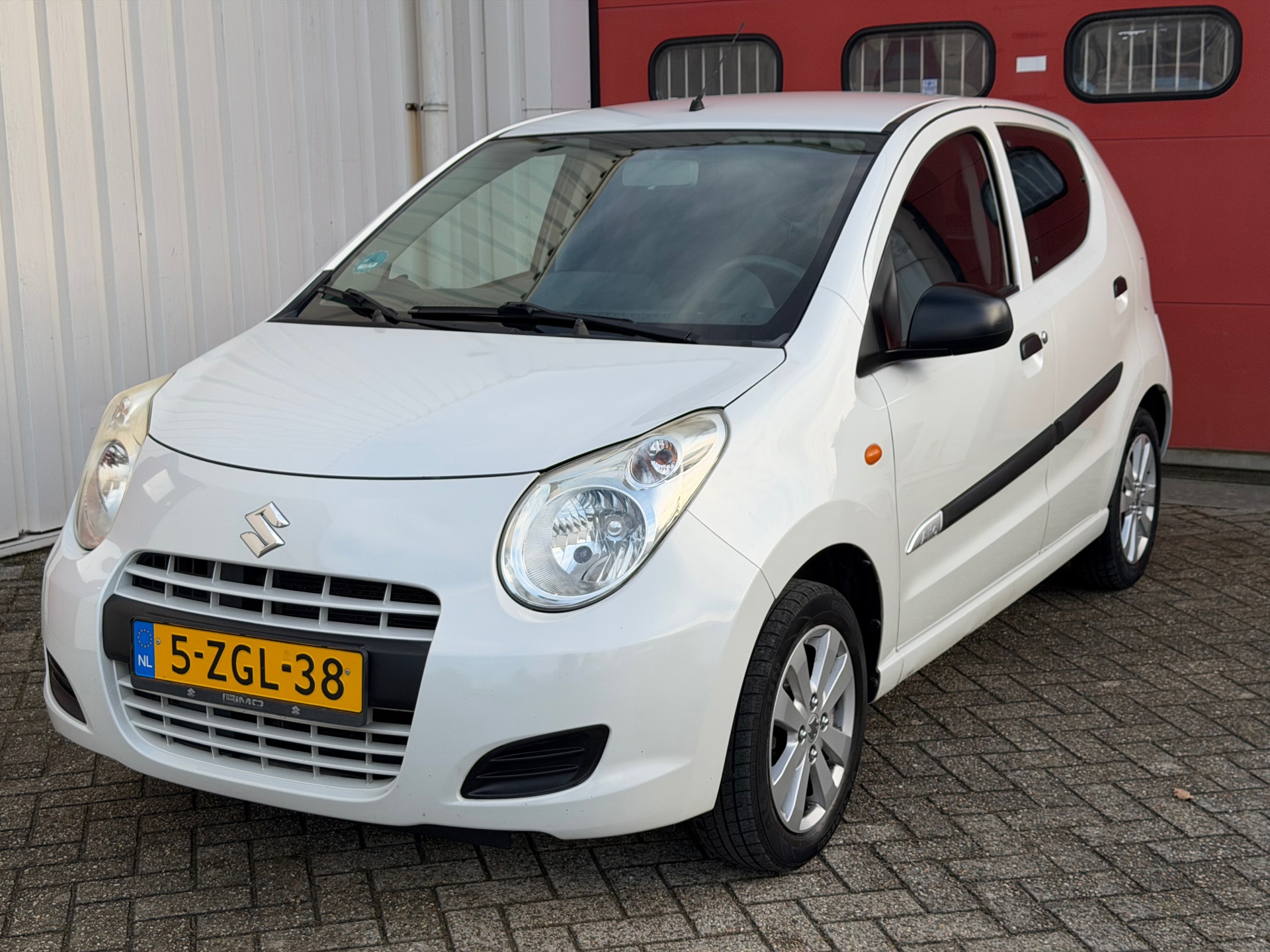 Suzuki Alto 1.0 Celebration Wit EASSS Airco NAP 2015 - voorkant
