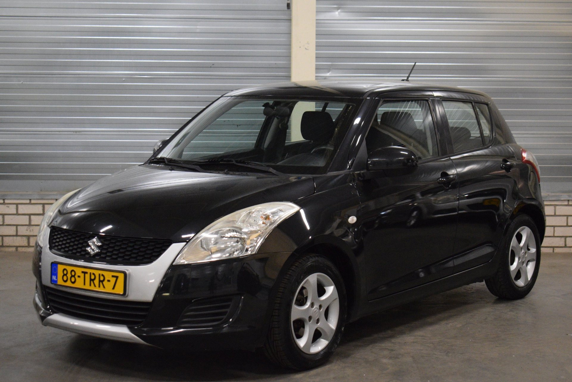 Suzuki Swift 1.2 Comfort EASSS + Airco|Stoelverwarming|Trekhaak| 2012 - voorkant