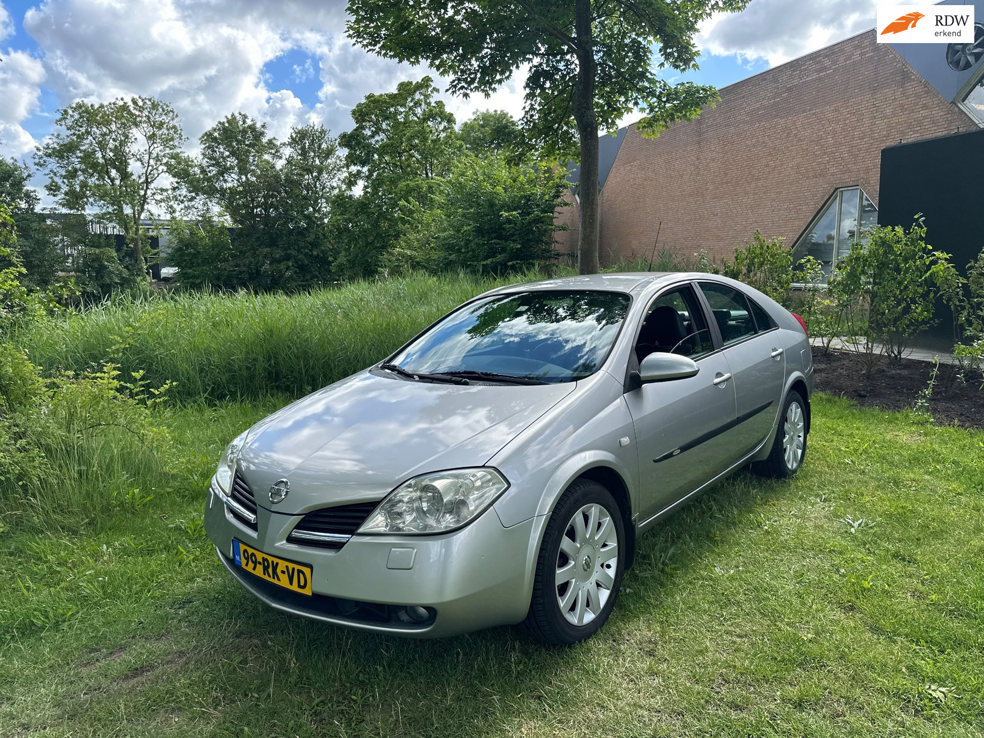 Nissan Nissan Primera 2.0 Tekna Pack Airco Camera Cruise Automaat 156DKM NAP!!! 2005 - voorkant