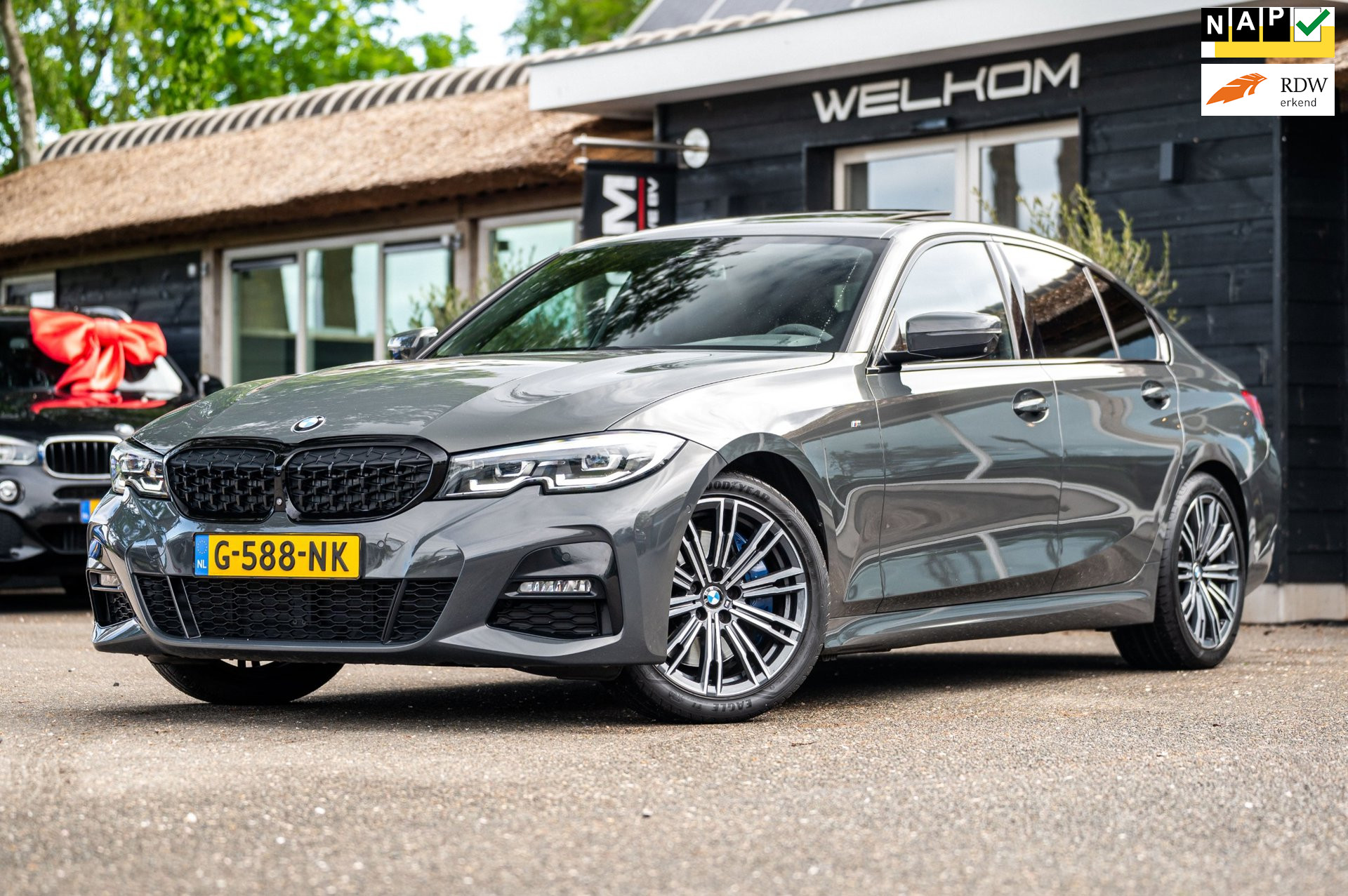 BMW 330i 330i High Executive Edition I Dravit grau I m pakket I 360 I Nap I Pano I 2019 - voorkant