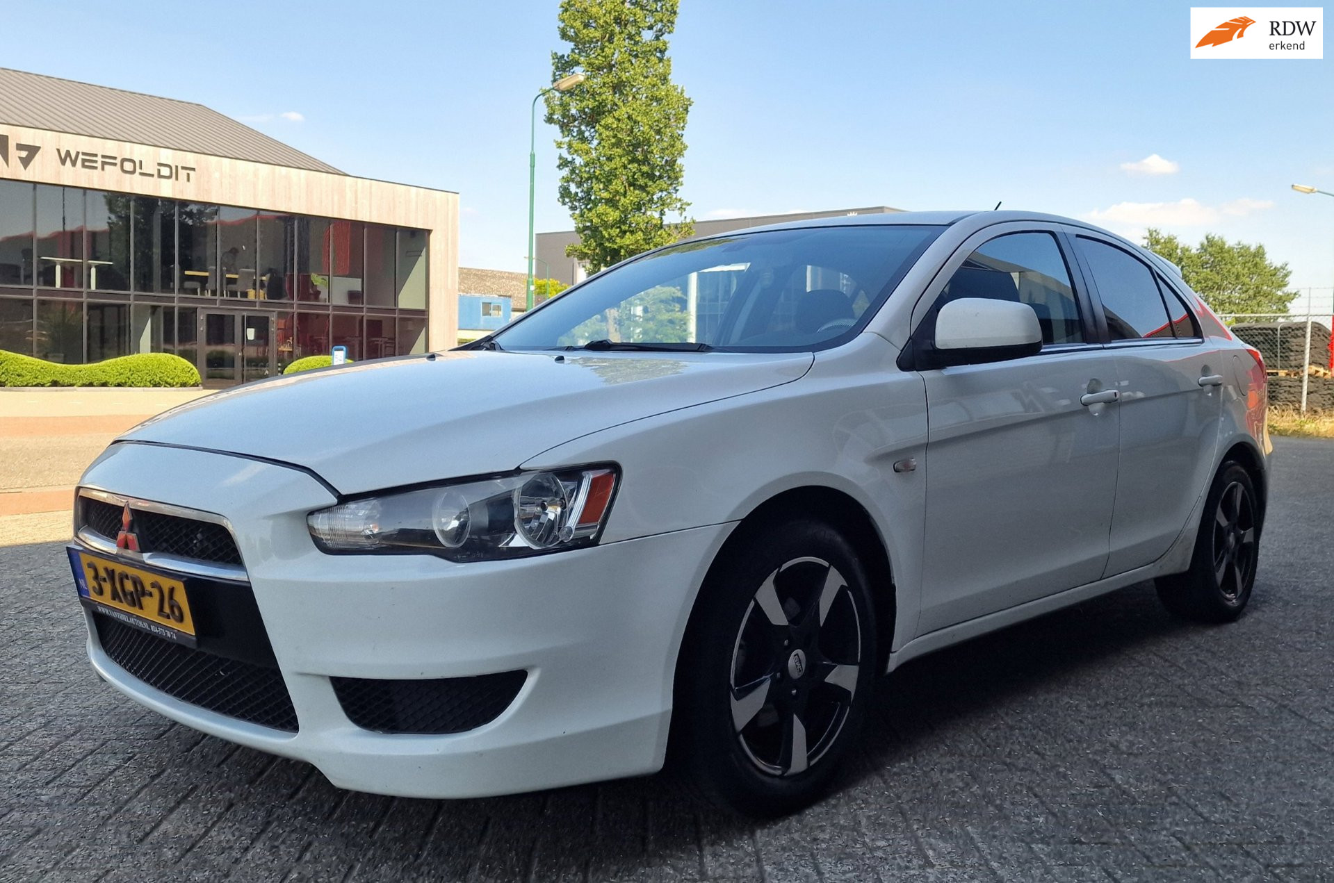 Mitsubishi Mitsubishi Lancer 1.6 Edition Two PSENSOR AIRCO BOEKJES 2011 - voorkant