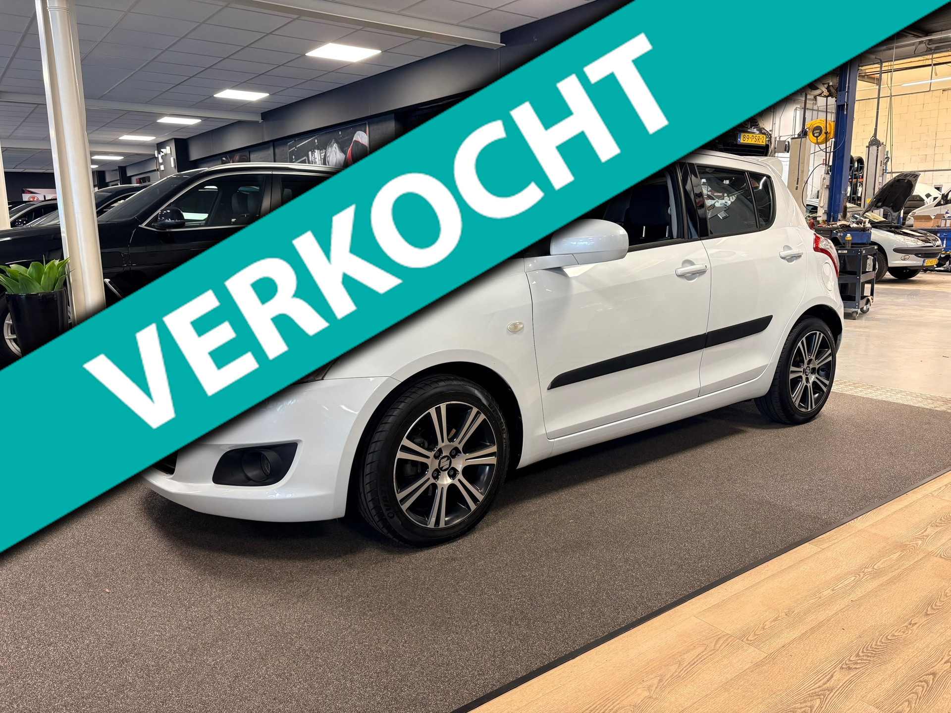 Suzuki Swift 1.2 Summer EASSS 5deurs /1e eigenaar / airco /stoelverwarming 2012 - voorkant