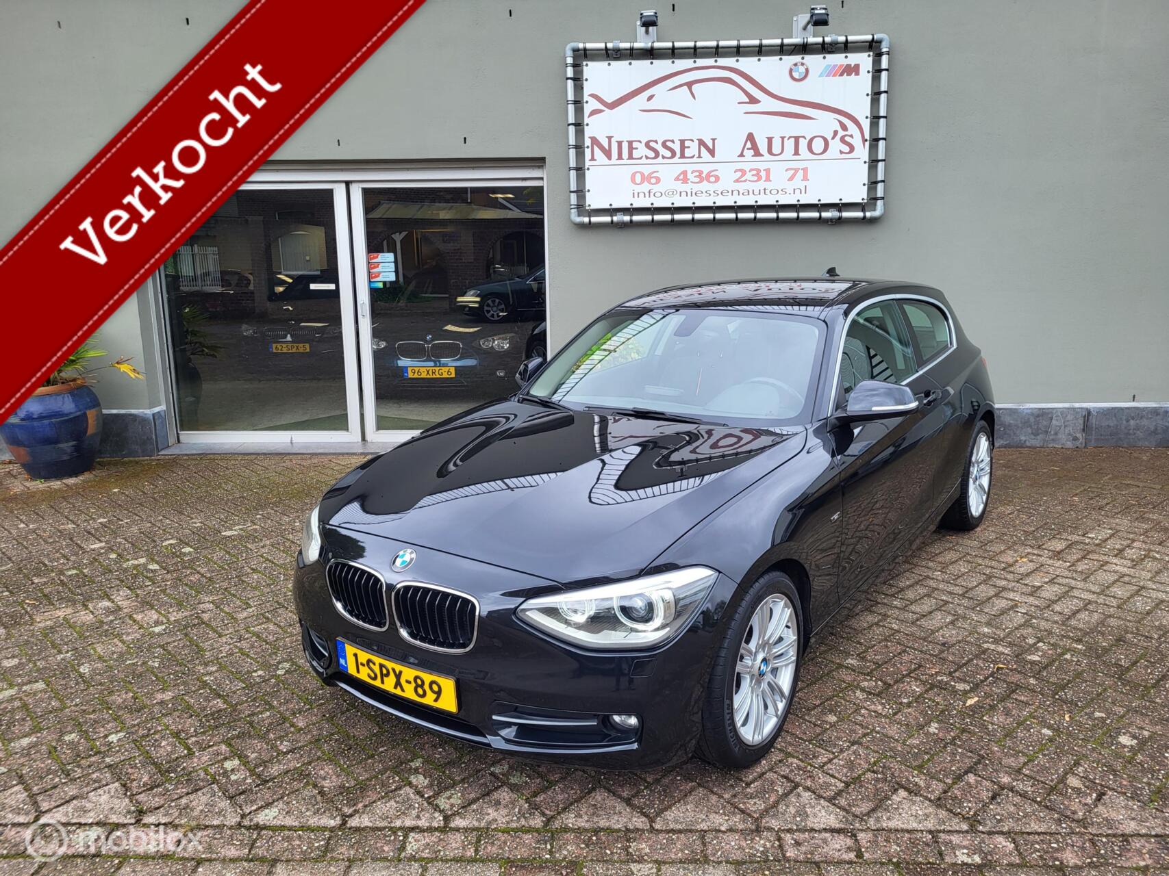 BMW 1er Reihe 116i EDE Sport Navi/Xenon/Trekhaak Ketting V.V 2013 - voorkant