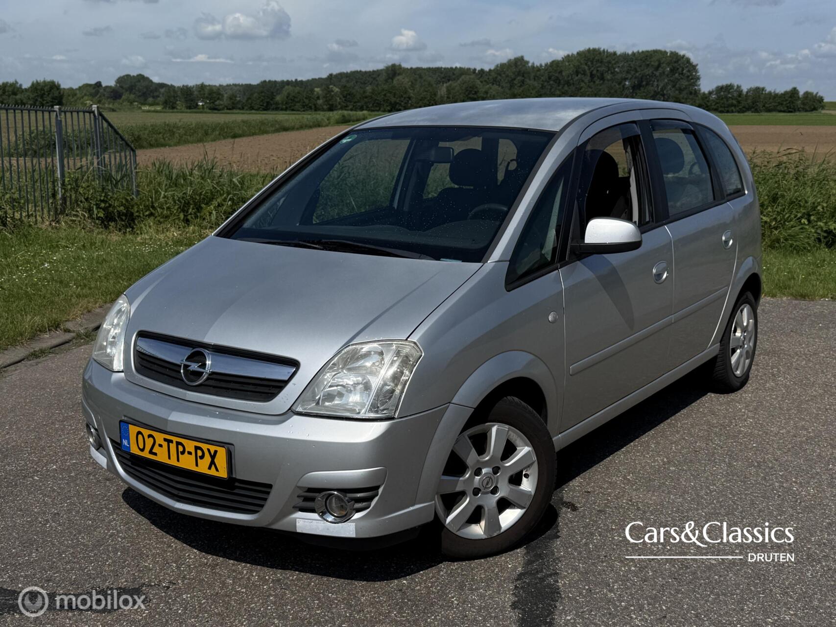 Opel Meriva-a 1.6-16V Cosmo | AIRCO | APK 03-2027 | TREKHAAK 2006 - voorkant