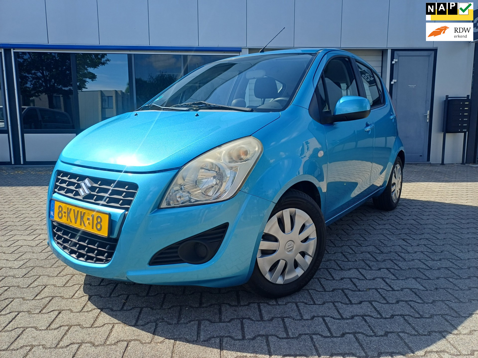 Suzuki Splash 1.0 VVT Comfort EASSS AIRCO/ELECRAMEN 2013 - voorkant