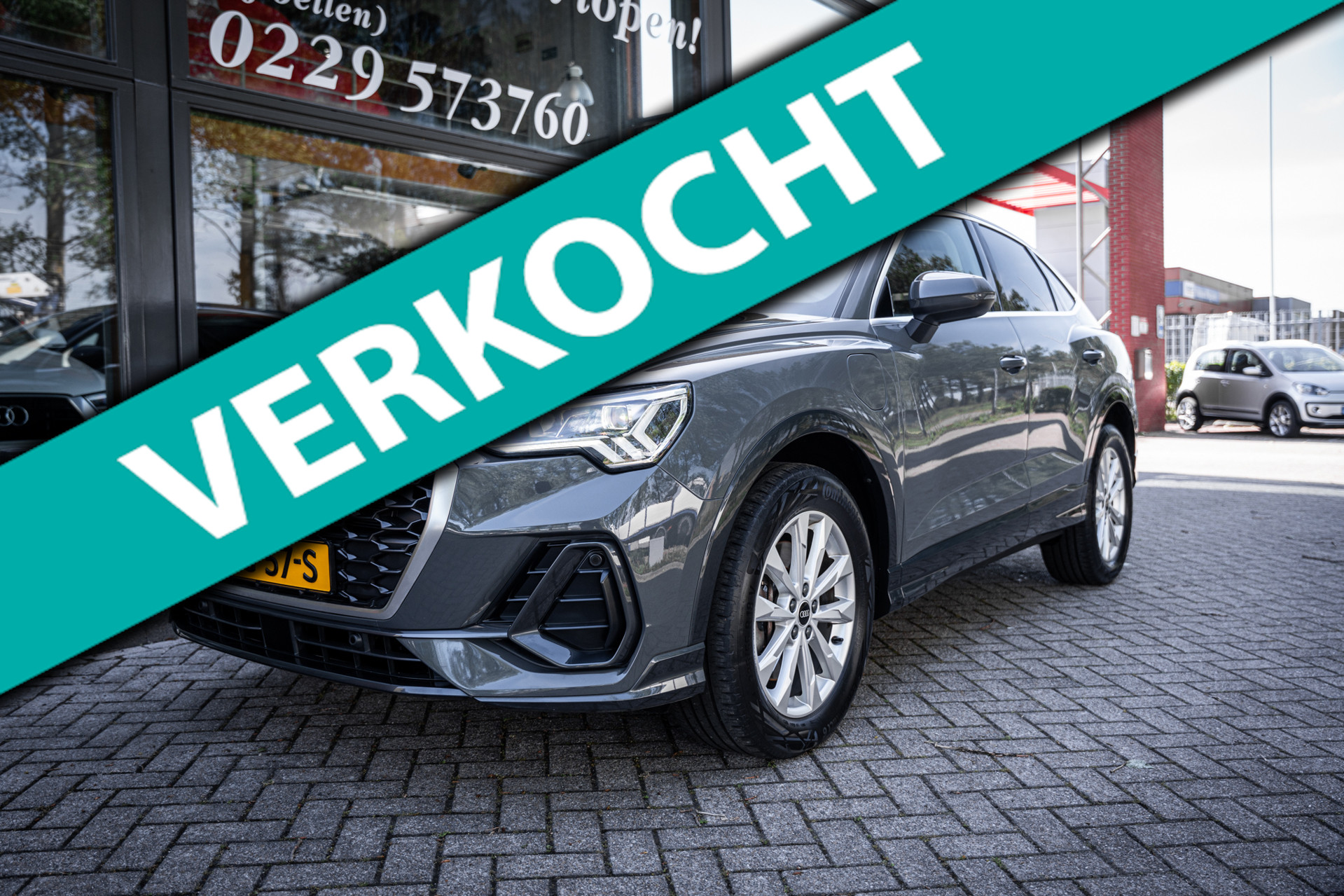 Audi Q3 Sportback E-tron 45 TFSI e Hybride | Lederen bekleding | Carplay | DAB | Camera | Stoelverwarming | Navigatie | Adaptieve cruise| 2022 - voorkant
