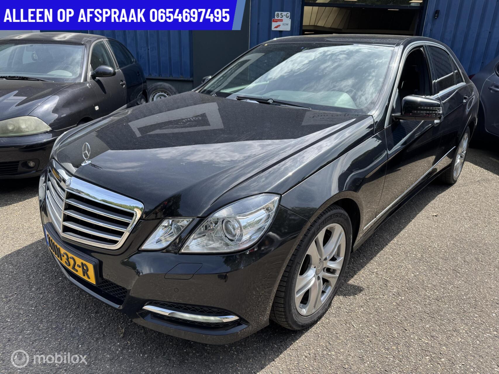Mercedes-Benz E 350 4Matic 350 CGI 306PK Avantgarde  91.DKM  AUT LEDER NAVI CRUISE PDC 2012 - voorkant
