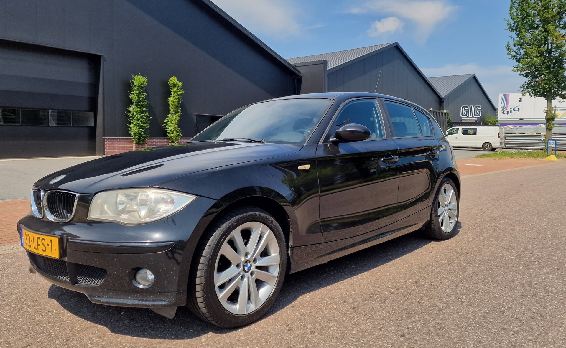 BMW 1er Reihe 116i AIRCO PSENSOR CRUISE 2 X SLEUTELS 2009 - voorkant