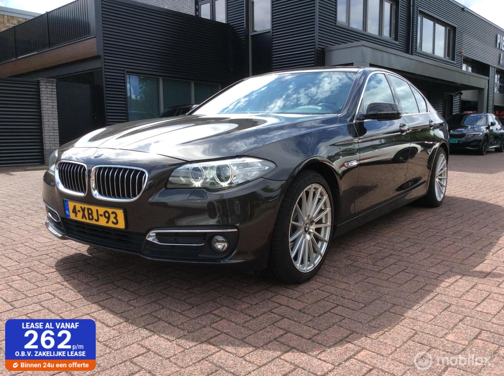 BMW 5-serie 520i Last Minute Edition Nav 19"lm vlg Leder Nap 2014 - voorkant