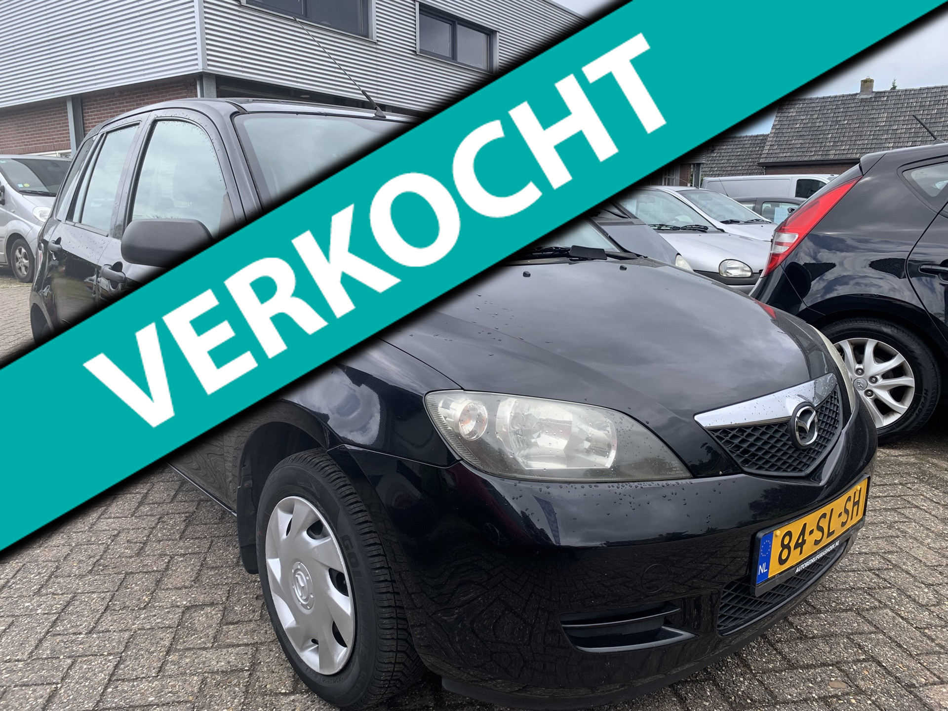 Mazda Mazda 2 1.4 Exclusive AUTOMAAT € 2450.- 2006 Zeer mooi 1 Jr. Apk 2006 - voorkant