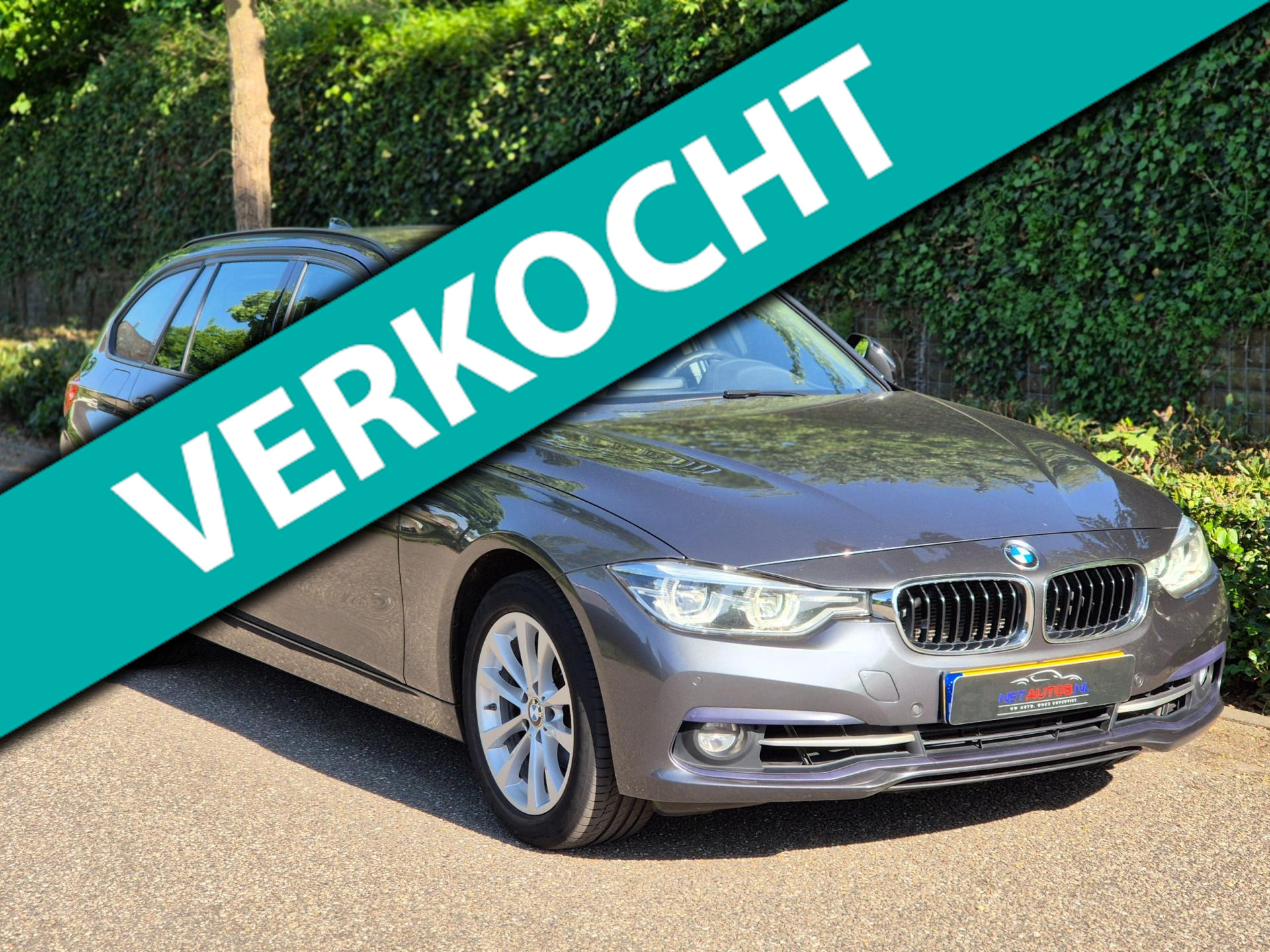 BMW 3-serie Touring F31 High Executive Sport Elk. Trekhaak Navi RIJKLAAR NEW APK Grijs Garantie MOG. 2018 - voorkant