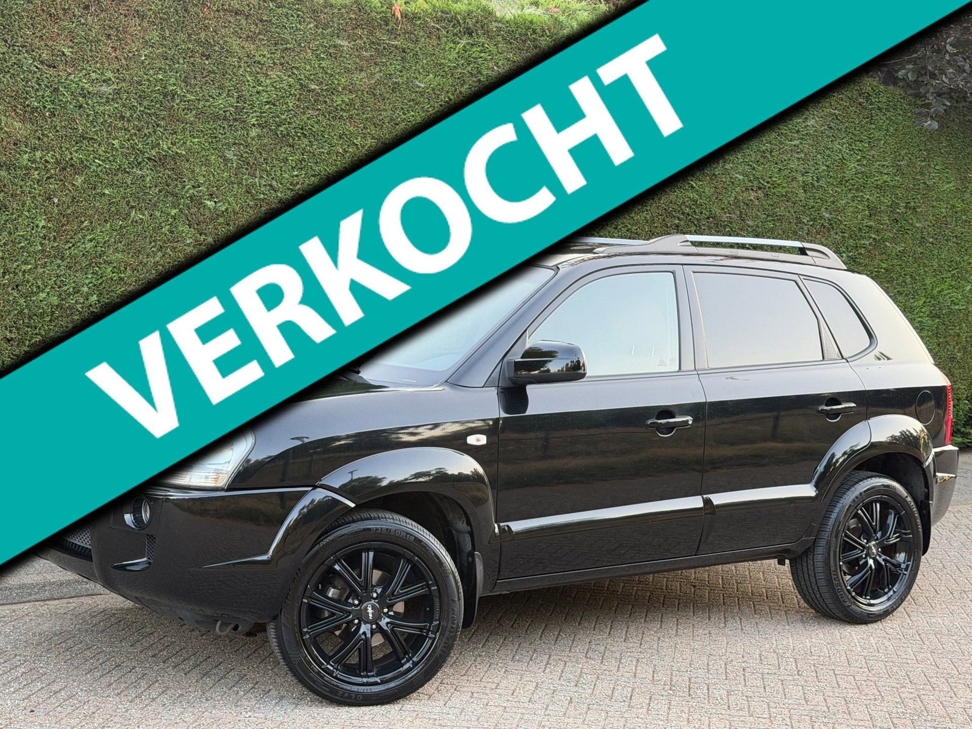 Hyundai Tucson 2.0i Style RIJDSUPER!/NLAUTO!/LEER/AIRCO 2006 - voorkant