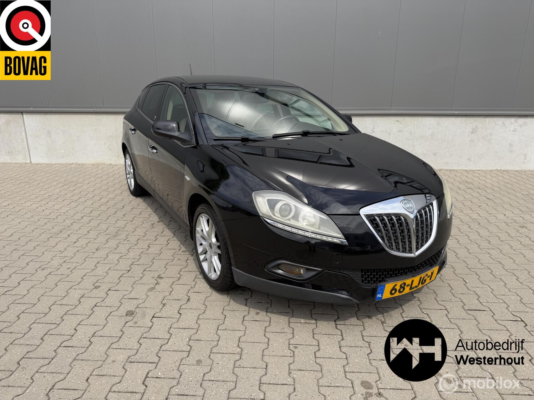 Lancia Delta 1.4-16V Oro Dealer onderhouden Navigatie NWE APK 2010 - voorkant