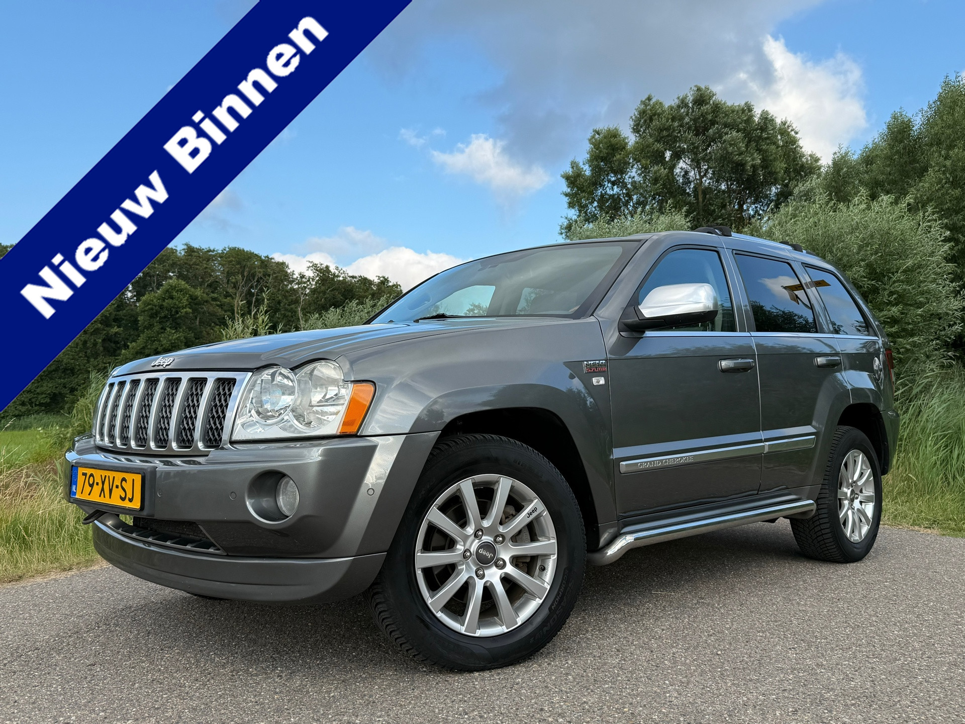 Jeep Grand Cherokee 5.7 V8 Hemi Limited Automaat | 1e Eigenaar | Schuif-/Kanteldak | Leder/Alcantara | Boston Premium Audio | Navi 2007 - voorkant