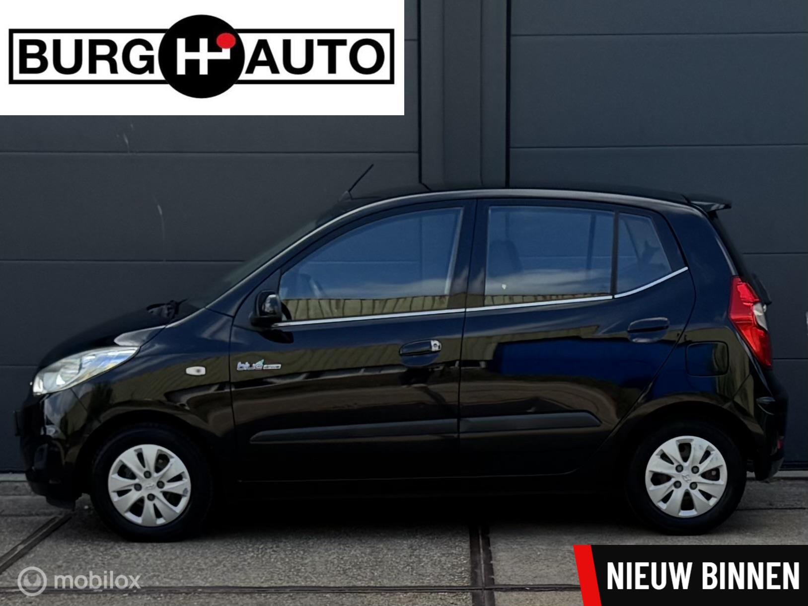 Hyundai I 10 1.0 i-Drive Cool 5 deurs - AIRCO - EL. RAMEN - CPV - STUURBEKRACHTIGING - RADIO/CD - AUX/IPOD/USB - DAKSPOILER - NAP - NL AUTO - APK T/M 20-03-2027- 2012 - voorkant