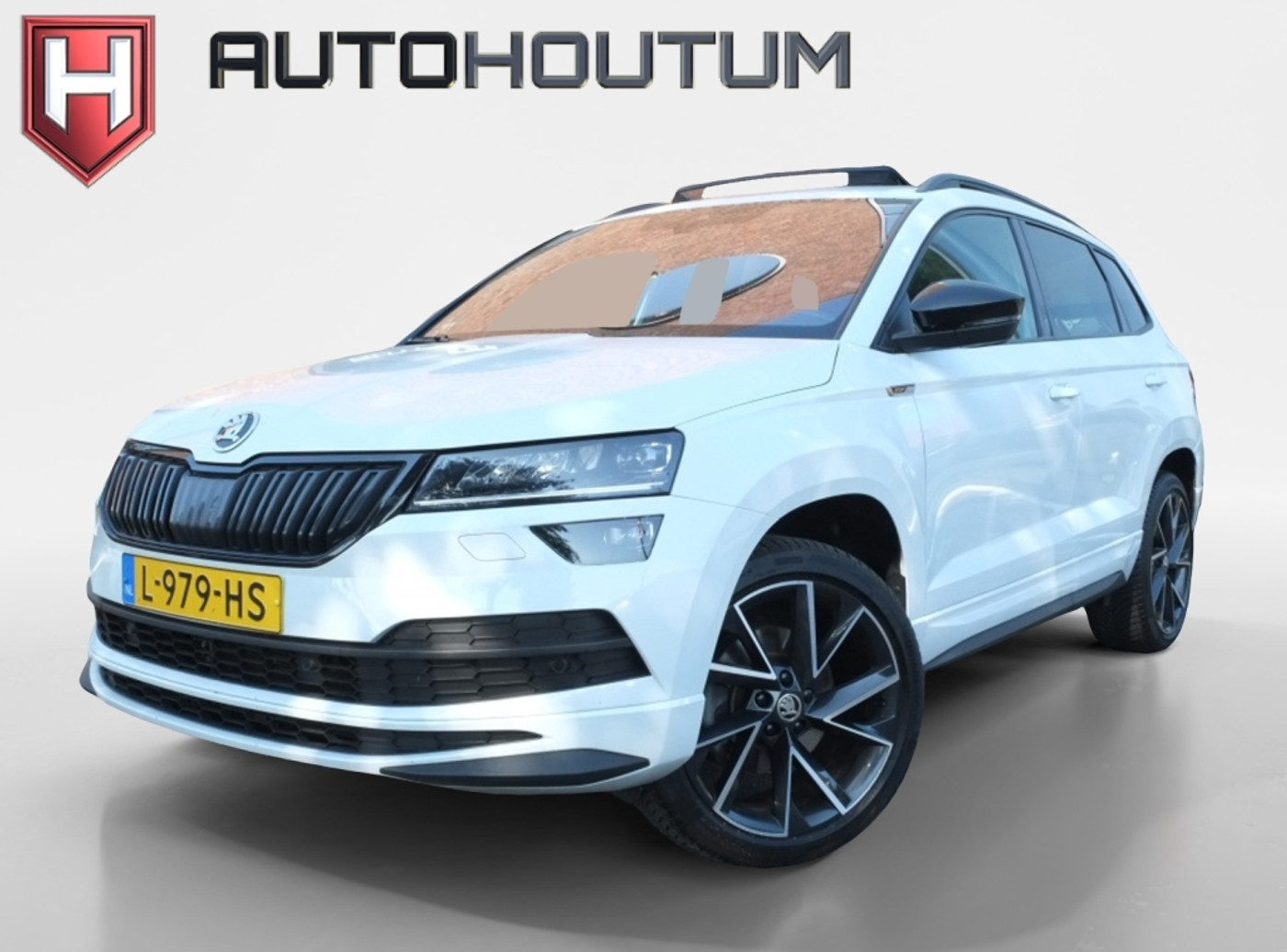 Skoda Karoq 1.5 TSI DSG Sportline | Panoramadak | Trekhaak | Achteruitrijcam 2021 - voorkant