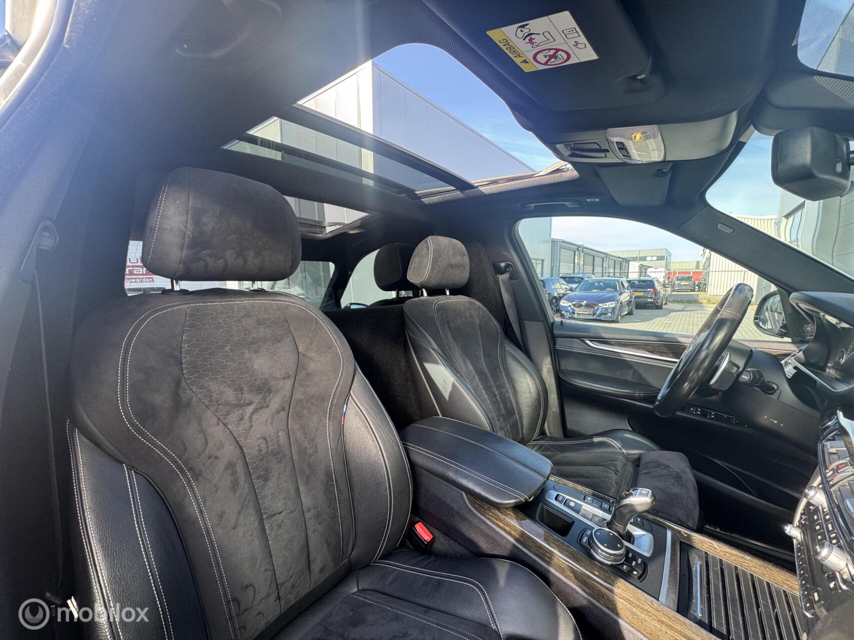Foto van BMW X5 M50d