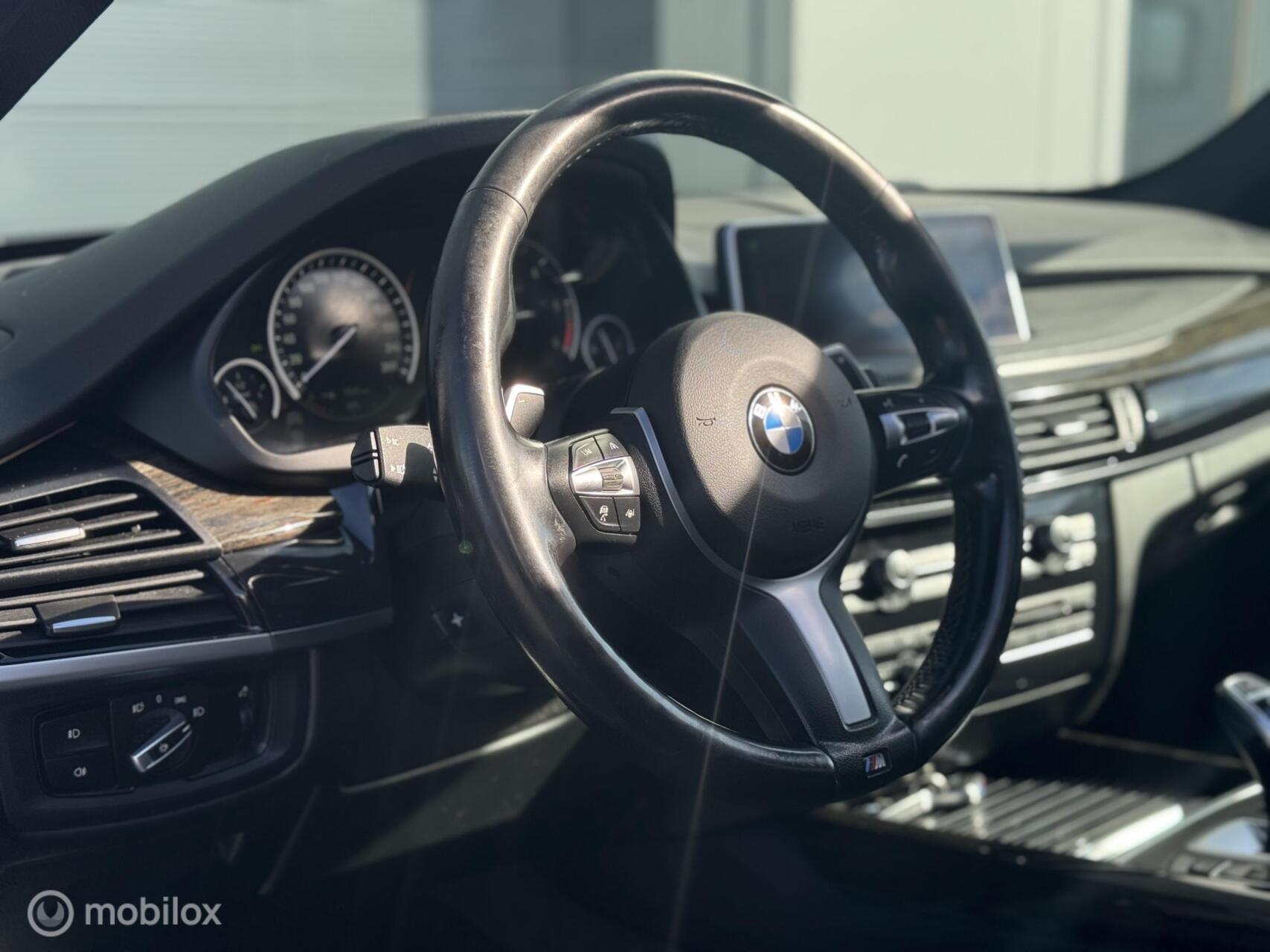 Foto van BMW X5 M50d