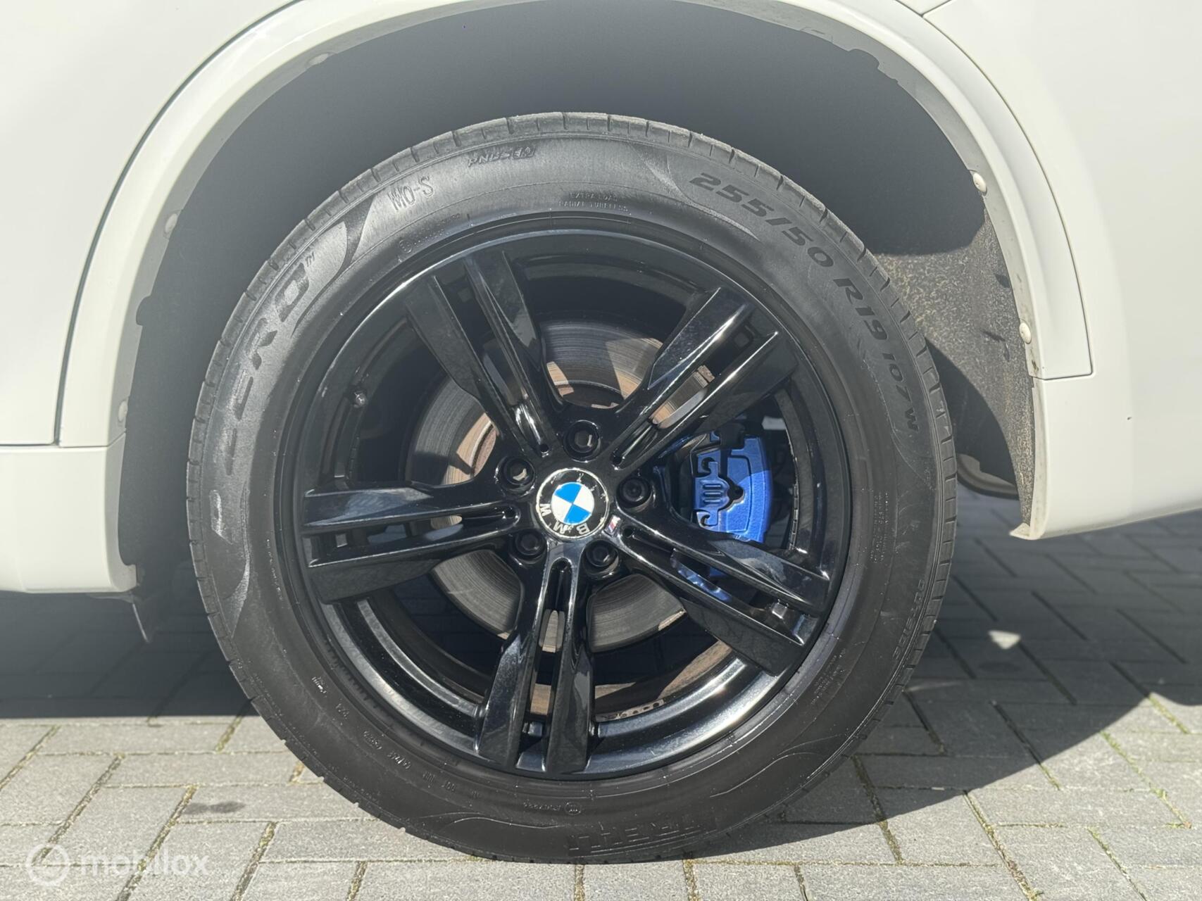 Foto van BMW X5 M50d